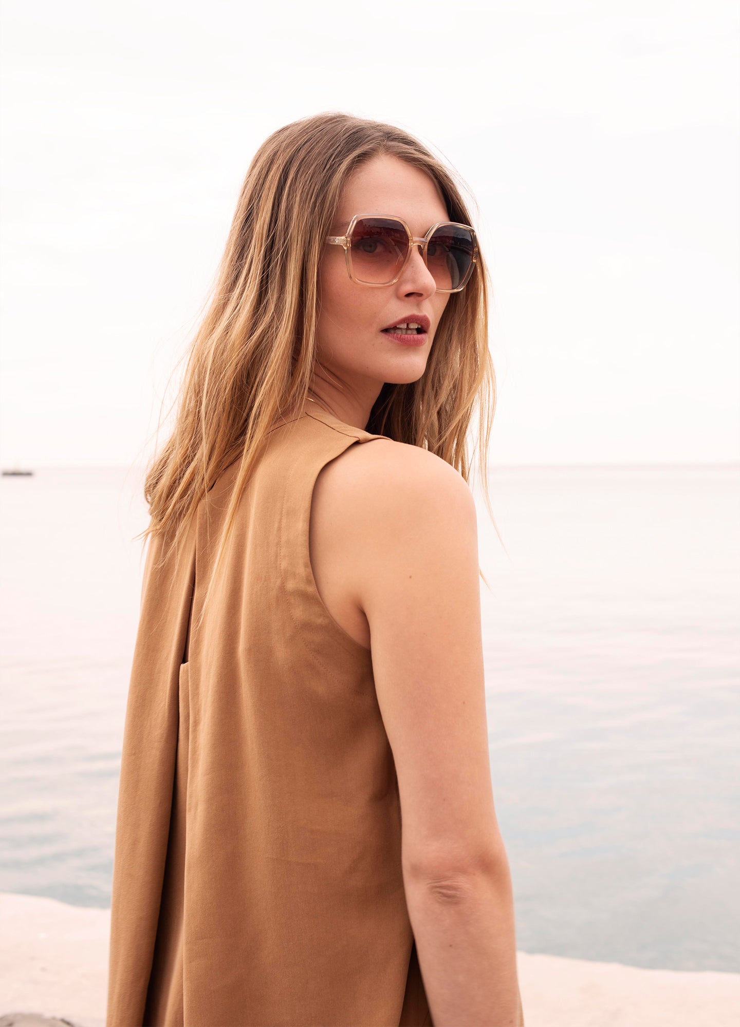 Sleeveless top with pleated detail