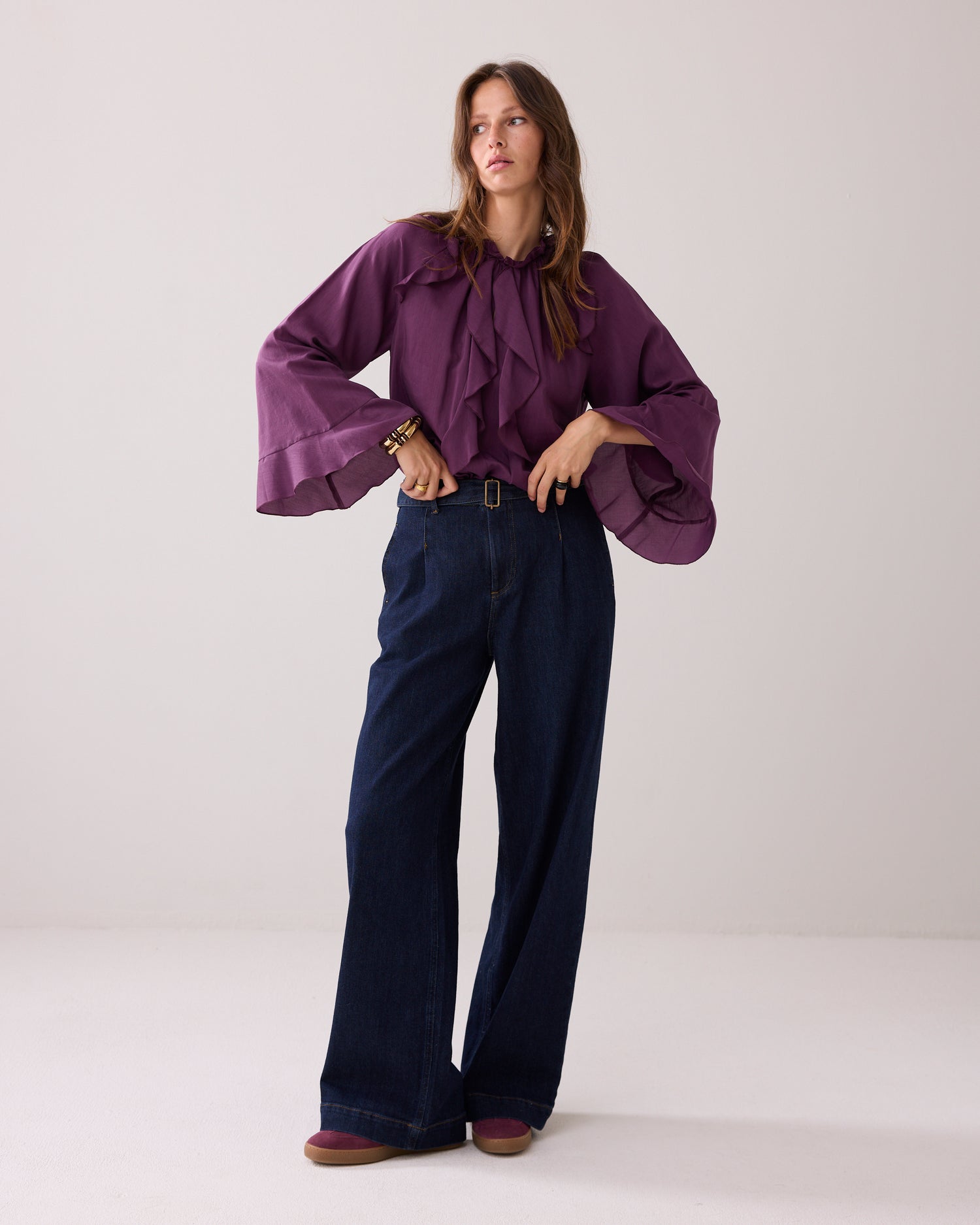 Shiny top with ruffles