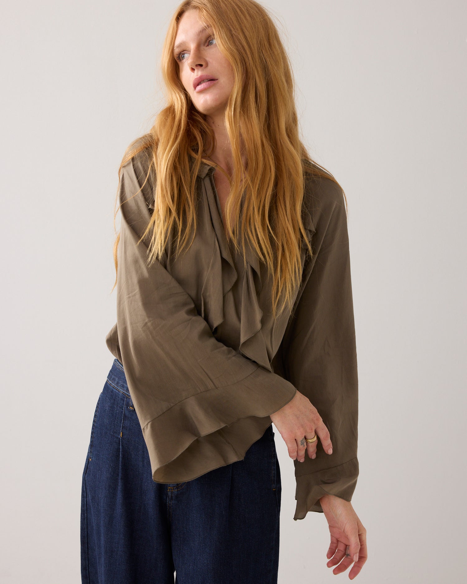Shiny top with ruffles