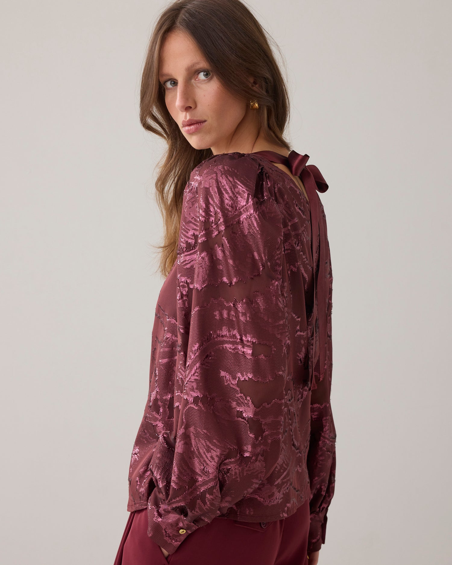 Top in shiny jacquard fabric