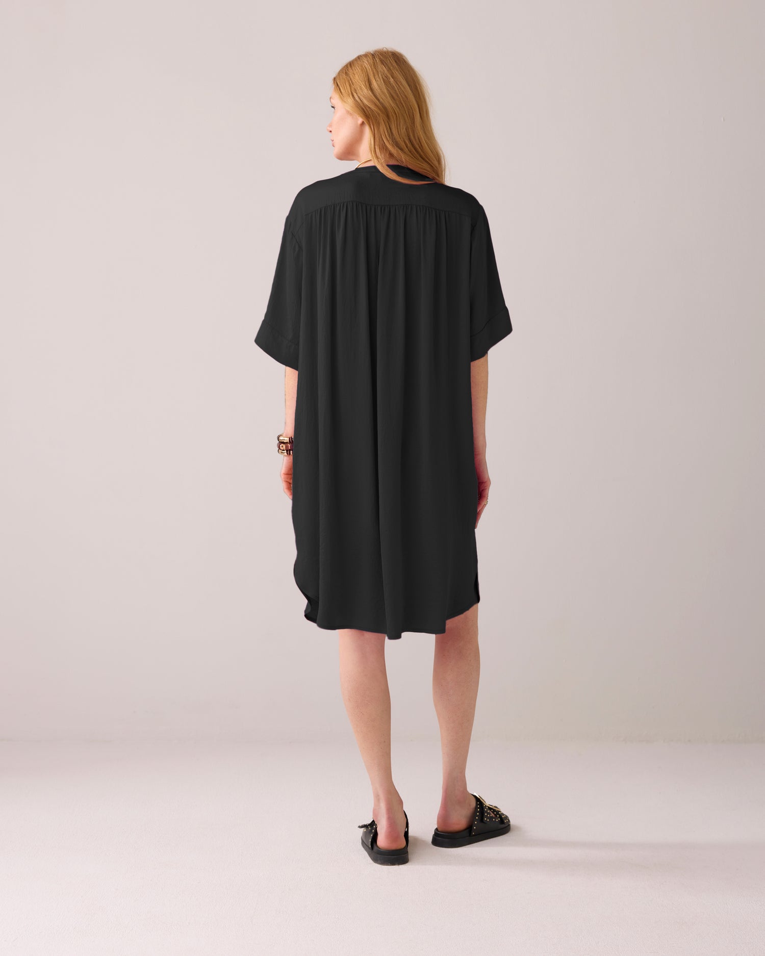 Tunic dress with button fastening