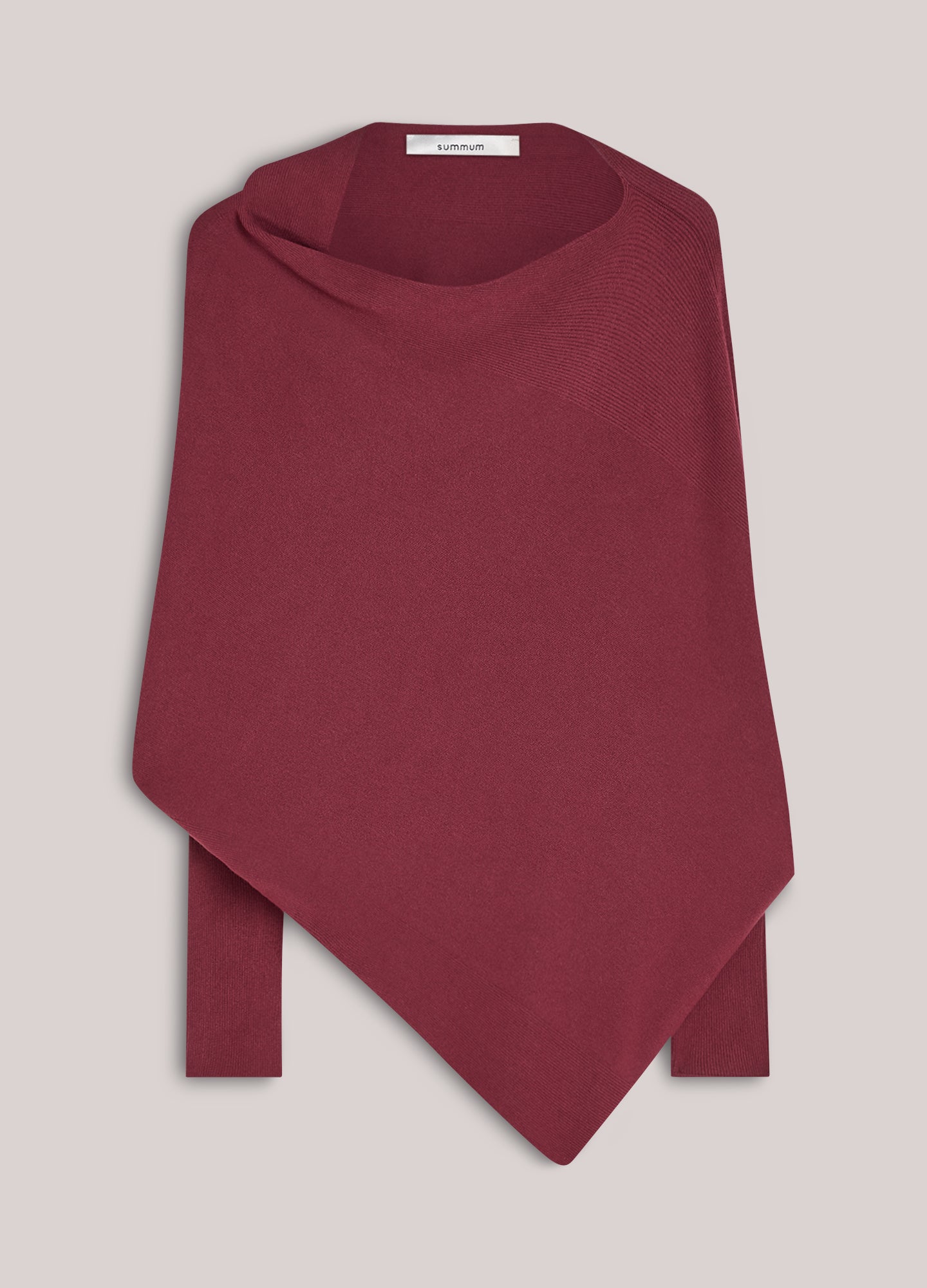 Asymmetric jumper in a seamless knit