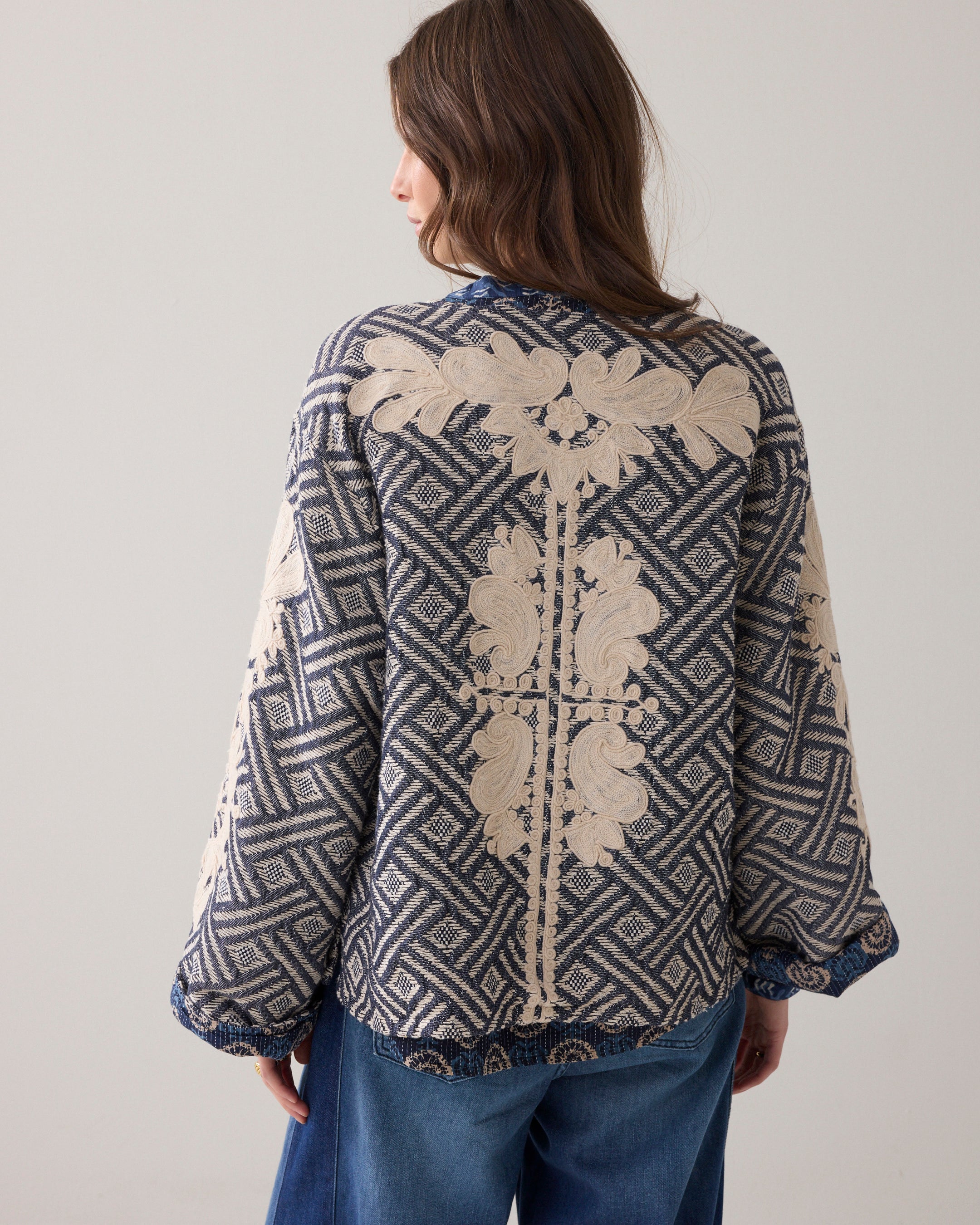 Reversible jacket with embroidery
