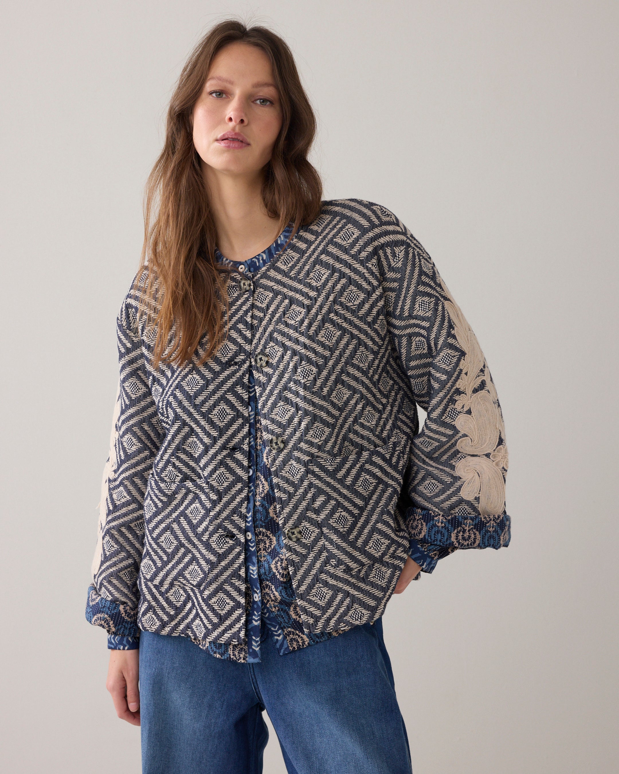 Reversible jacket with embroidery