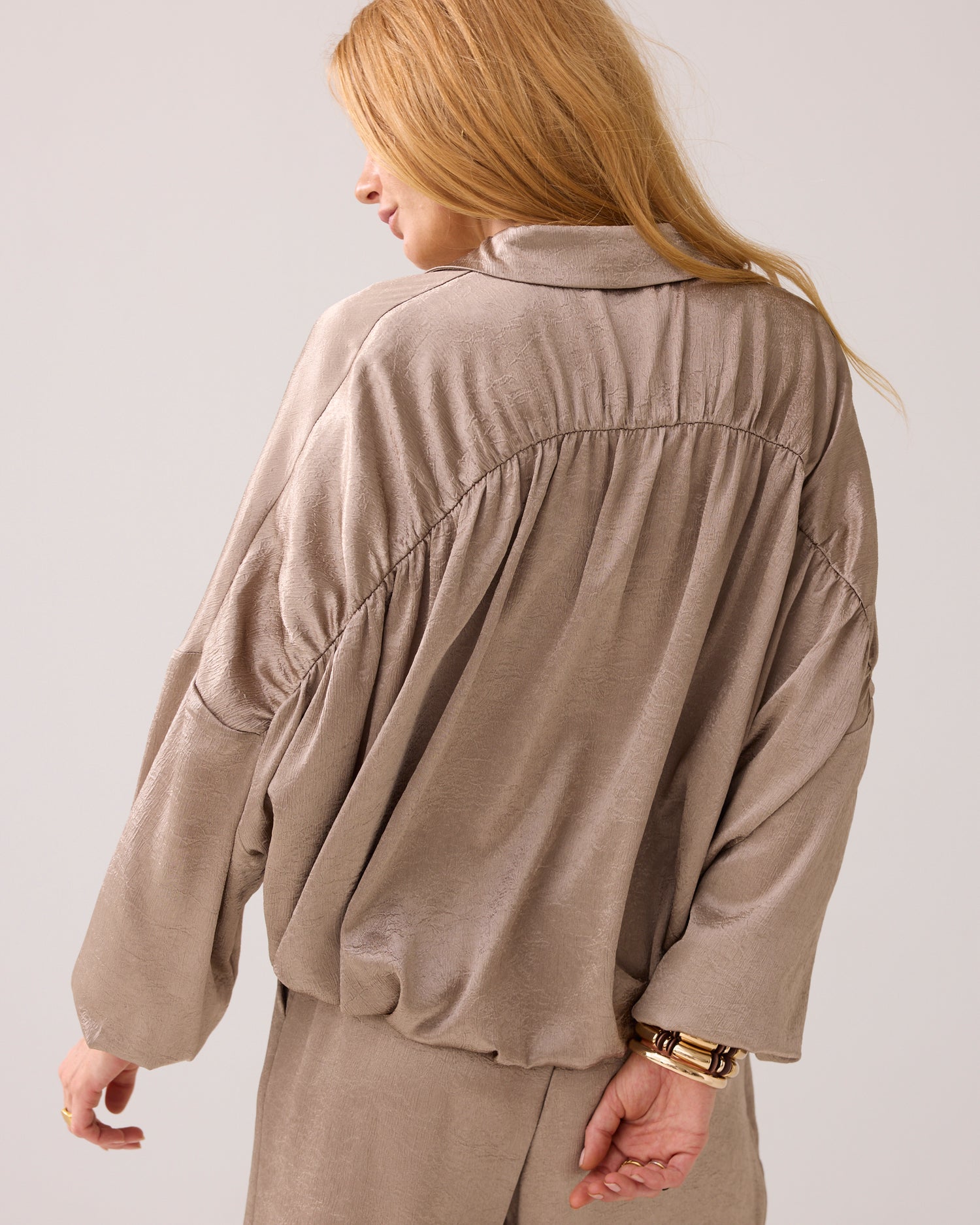 Glanzende wijde blouse