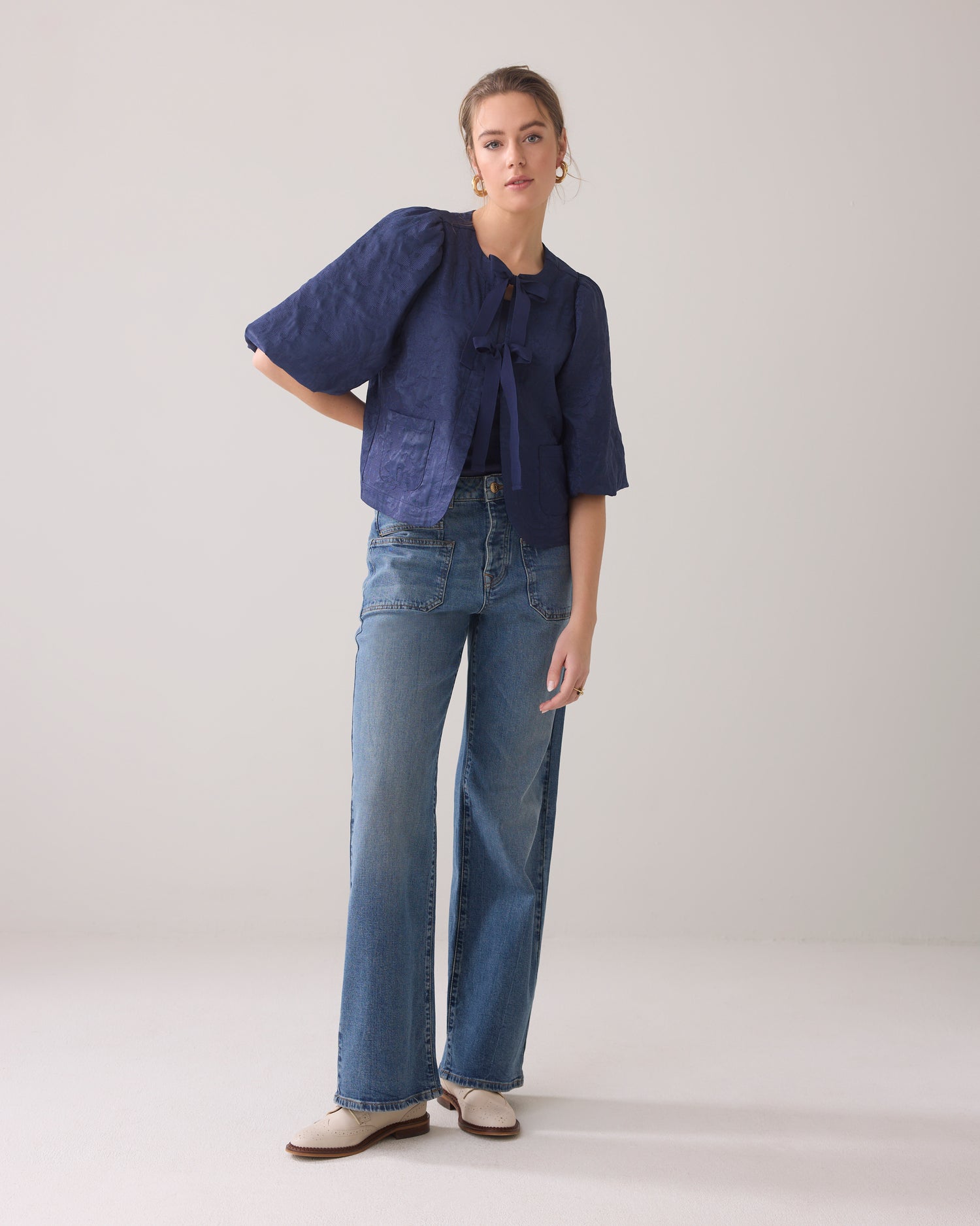 Blouse jacket with bow fastening