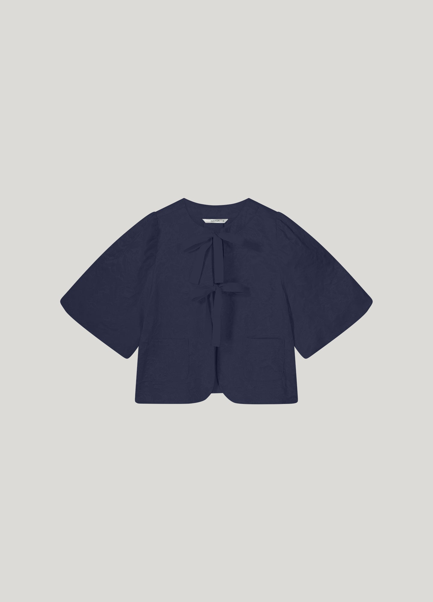 Blouse jacket with bow fastening