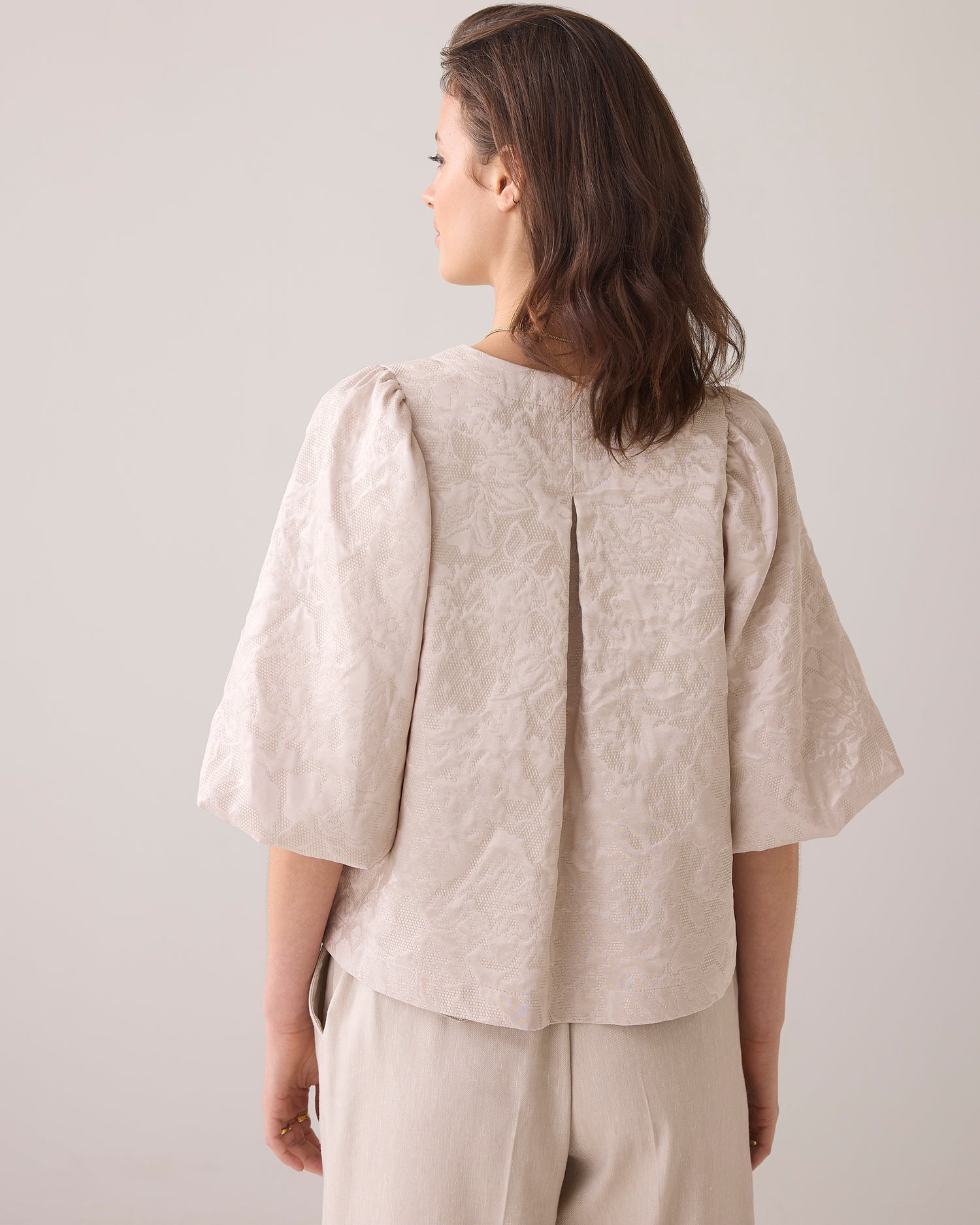 Blouse jacket with bow fastening