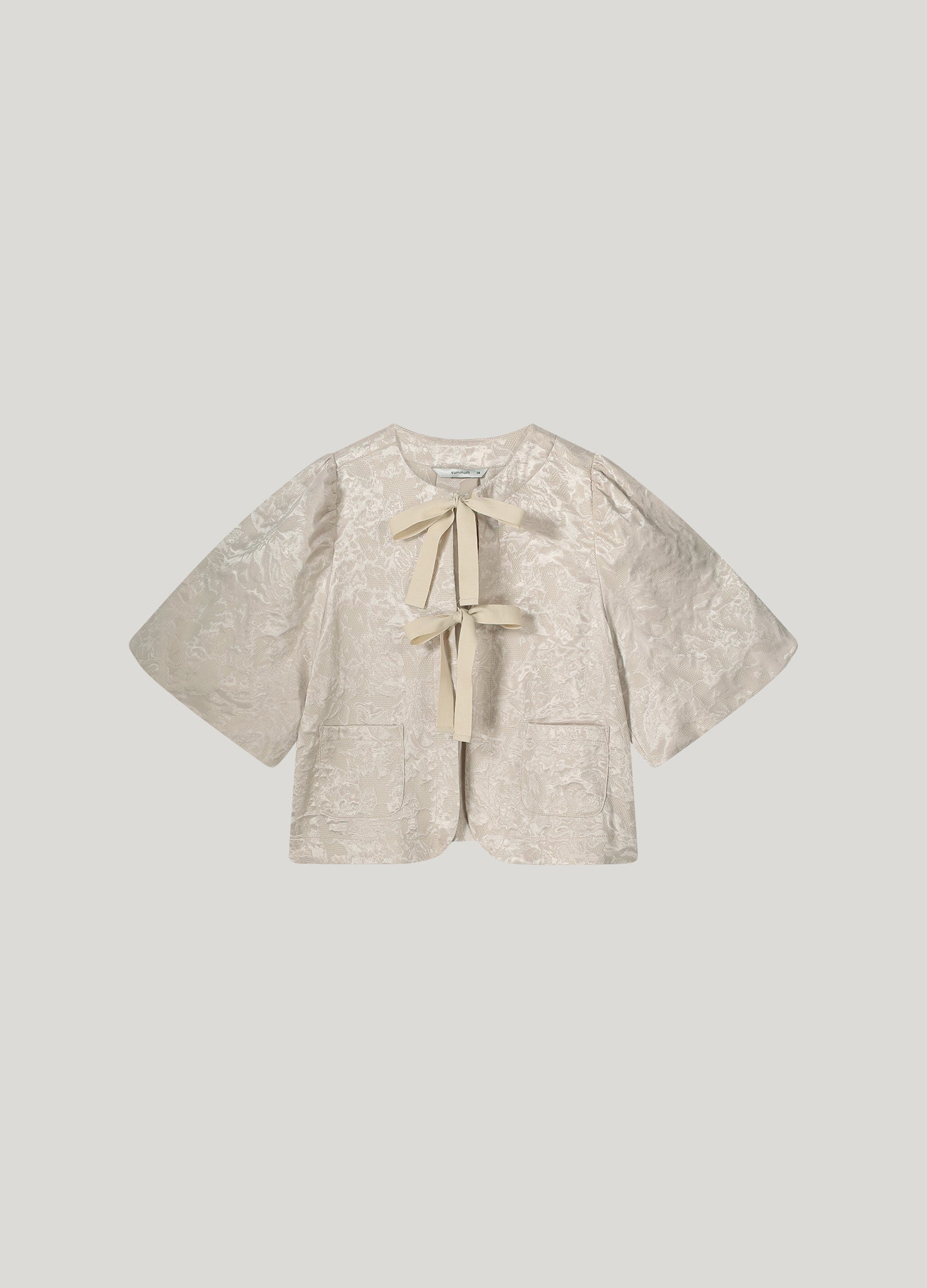 Blouse jacket with bow fastening