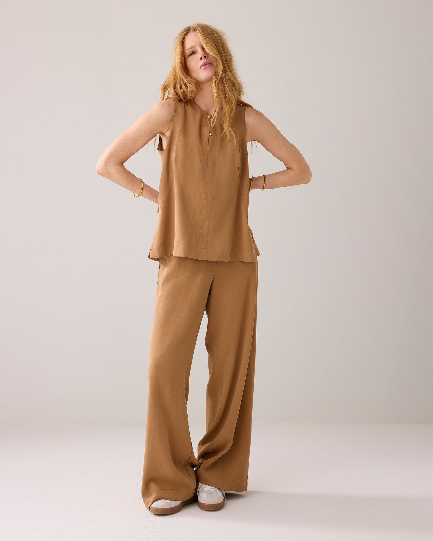 Sleeveless top with pleated detail