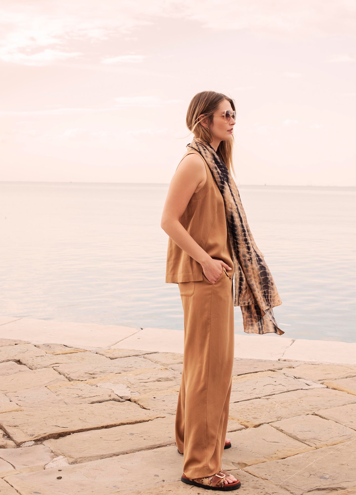 Sleeveless top with pleated detail