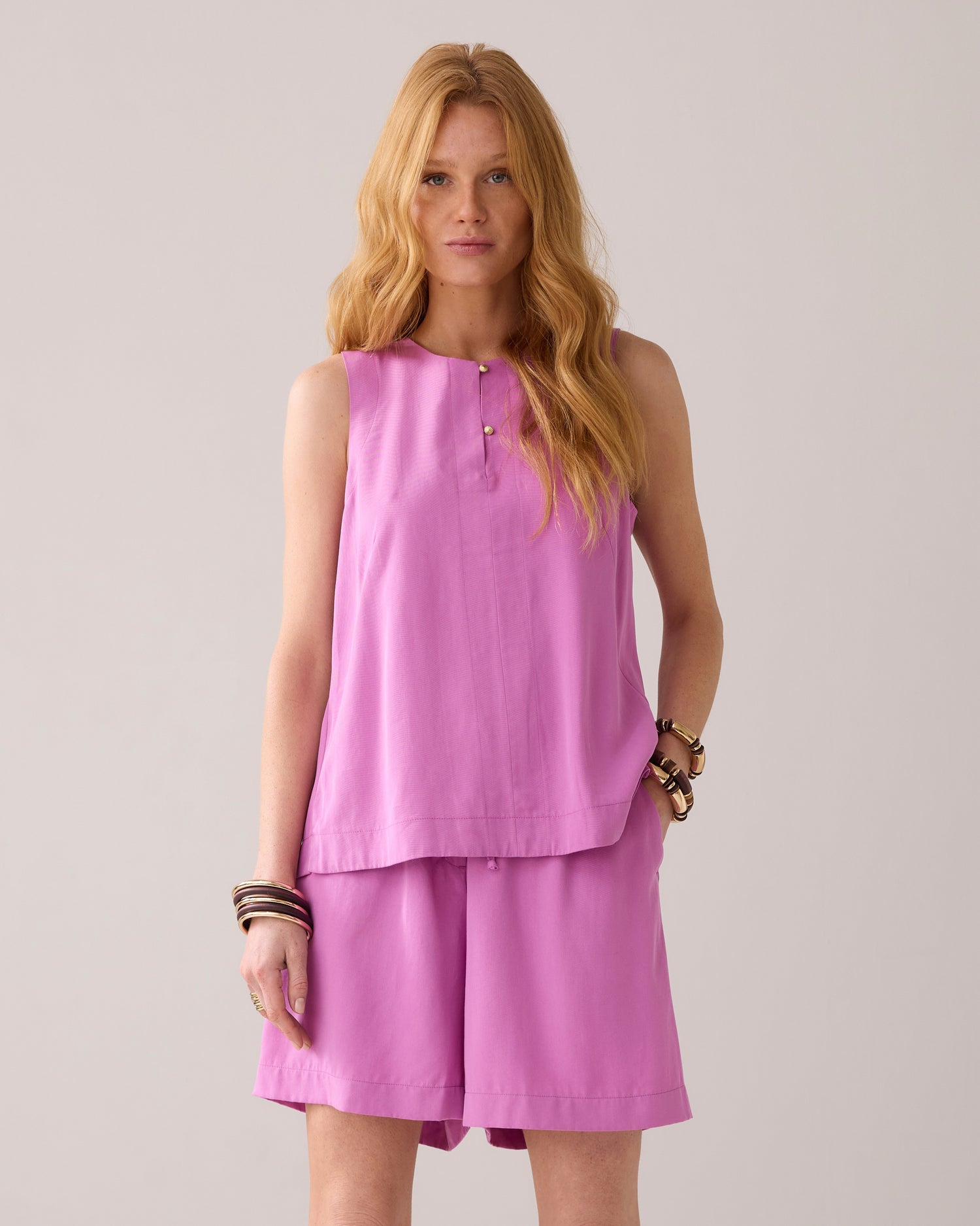 Sleeveless top with pleated detail