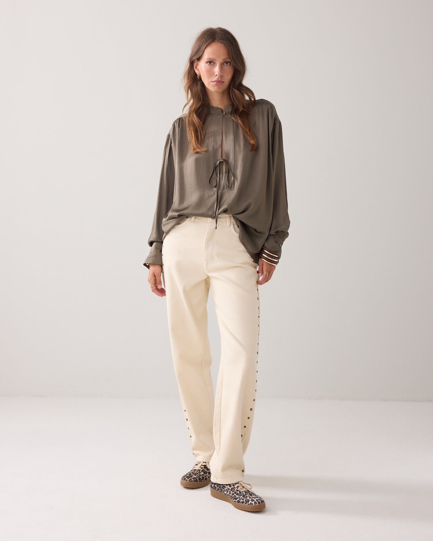Glanzende top met striksluiting
