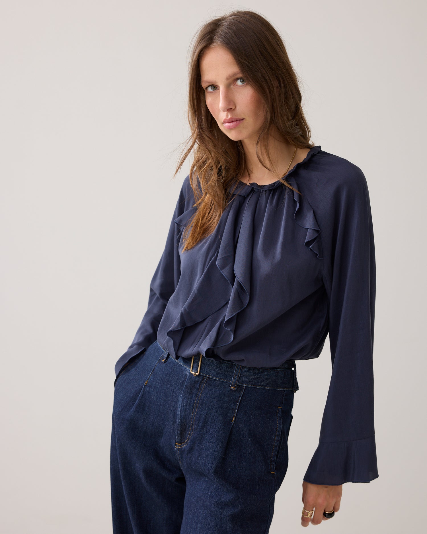Shiny top with ruffles