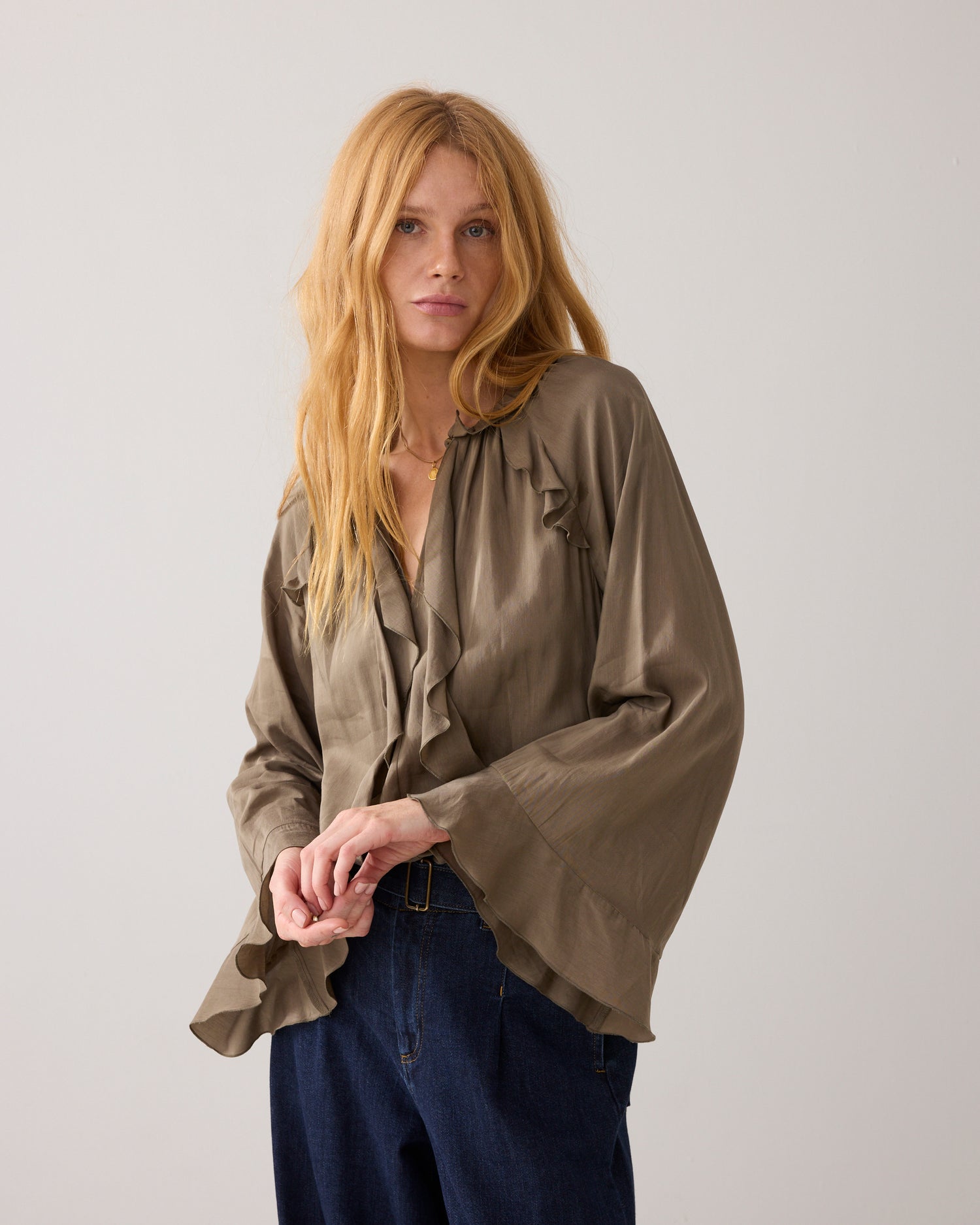 Glanzende top met ruches