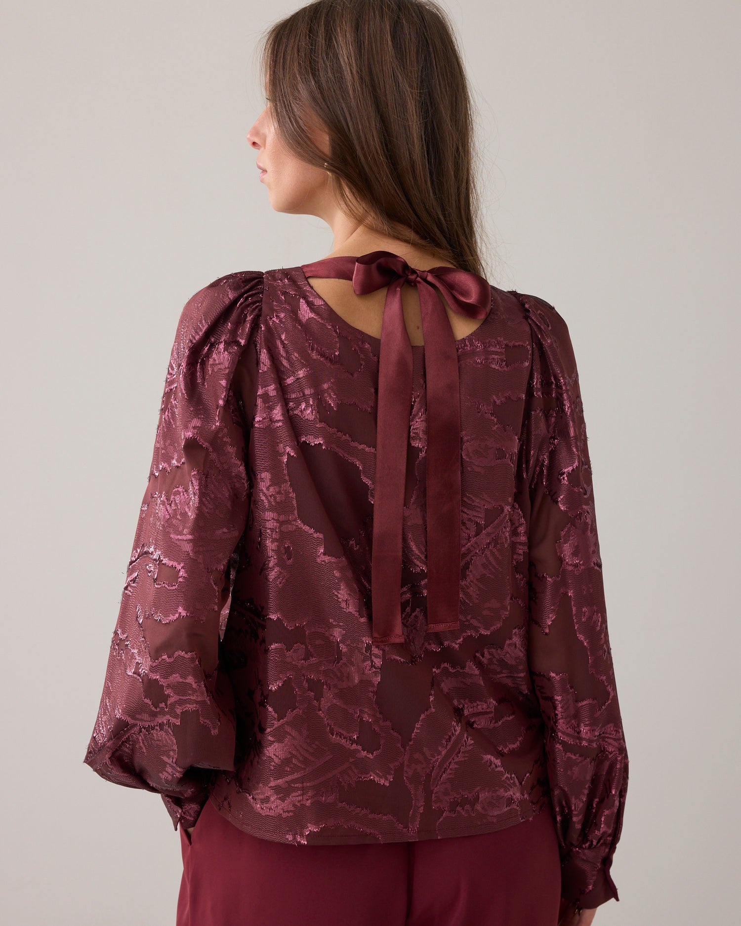 Top in shiny jacquard fabric