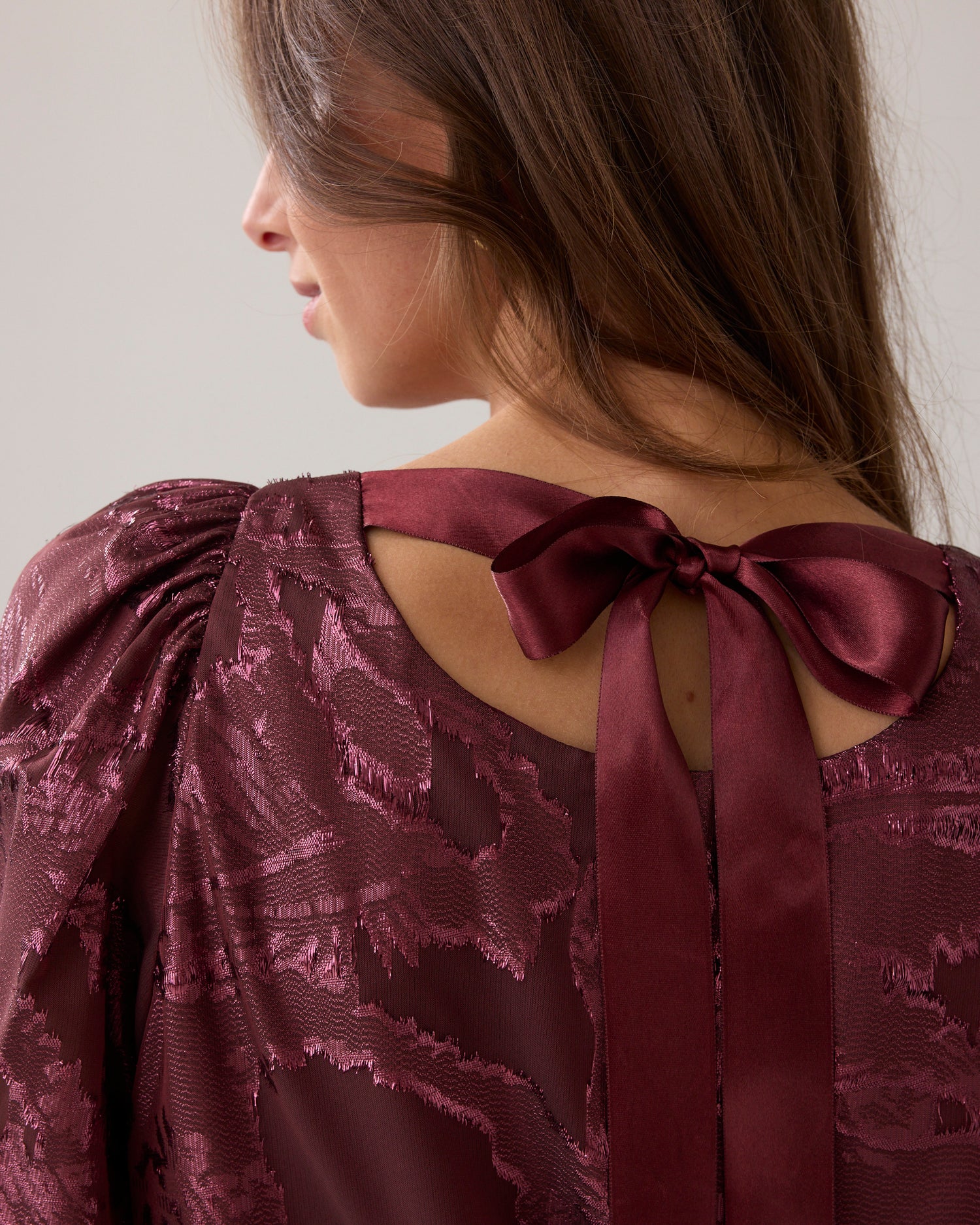 Top in shiny jacquard fabric