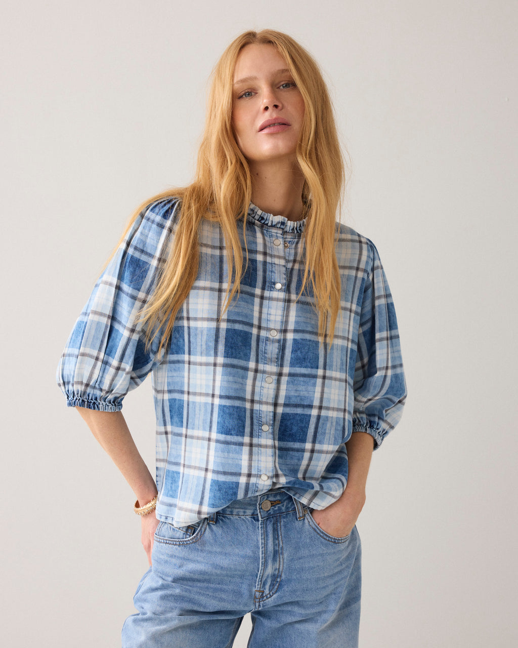 Blouse à carreaux avec manches bouffantes