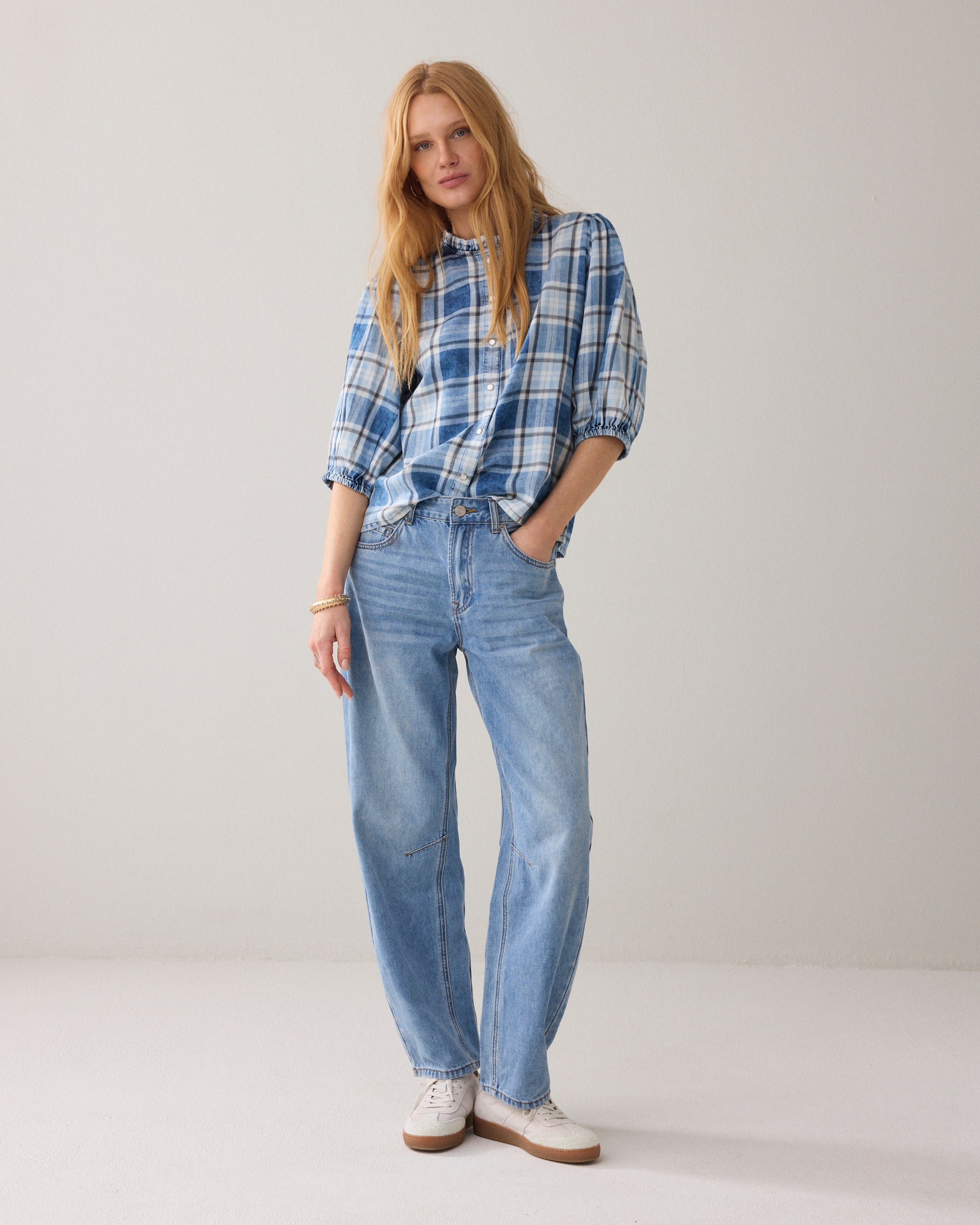 Blouse à carreaux avec manches bouffantes