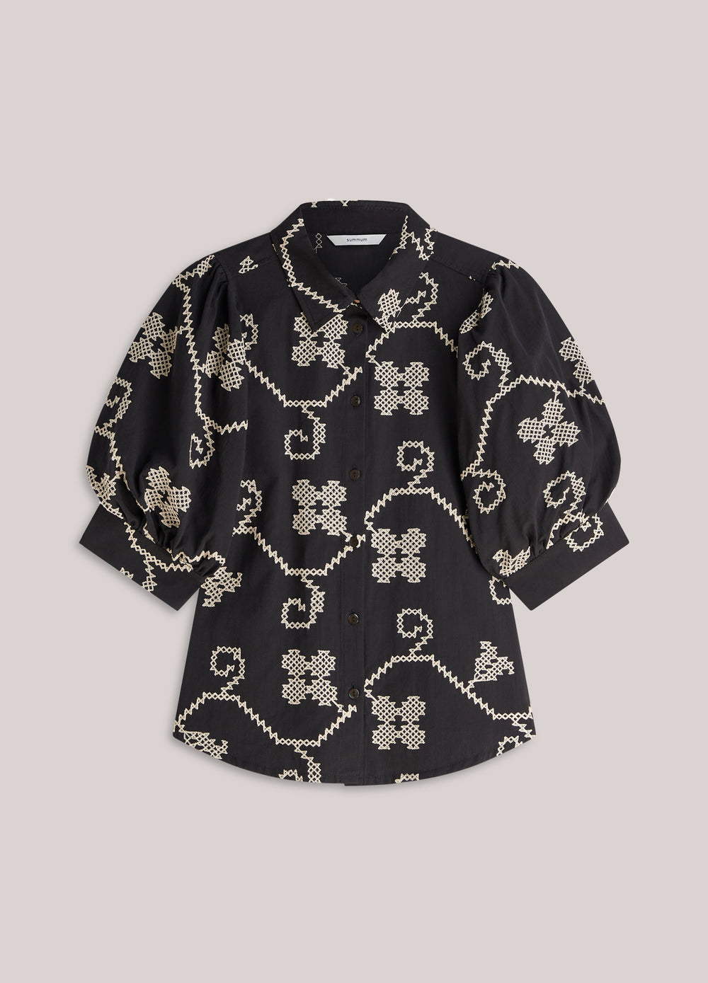 Geborduurde blouse contrast