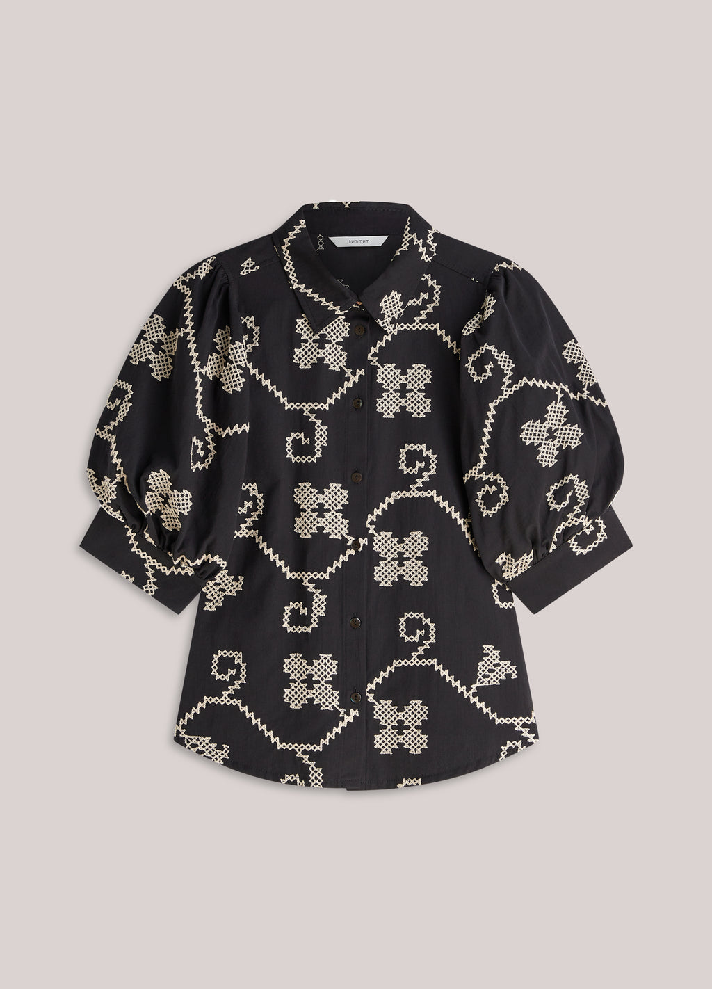 Geborduurde blouse contrast