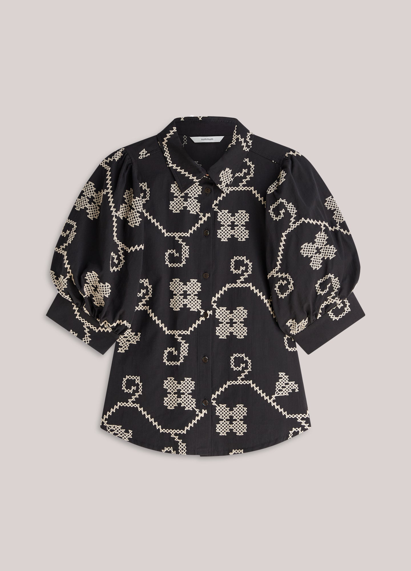 Geborduurde blouse contrast