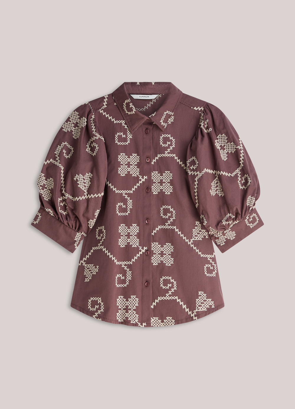 Geborduurde blouse contrast