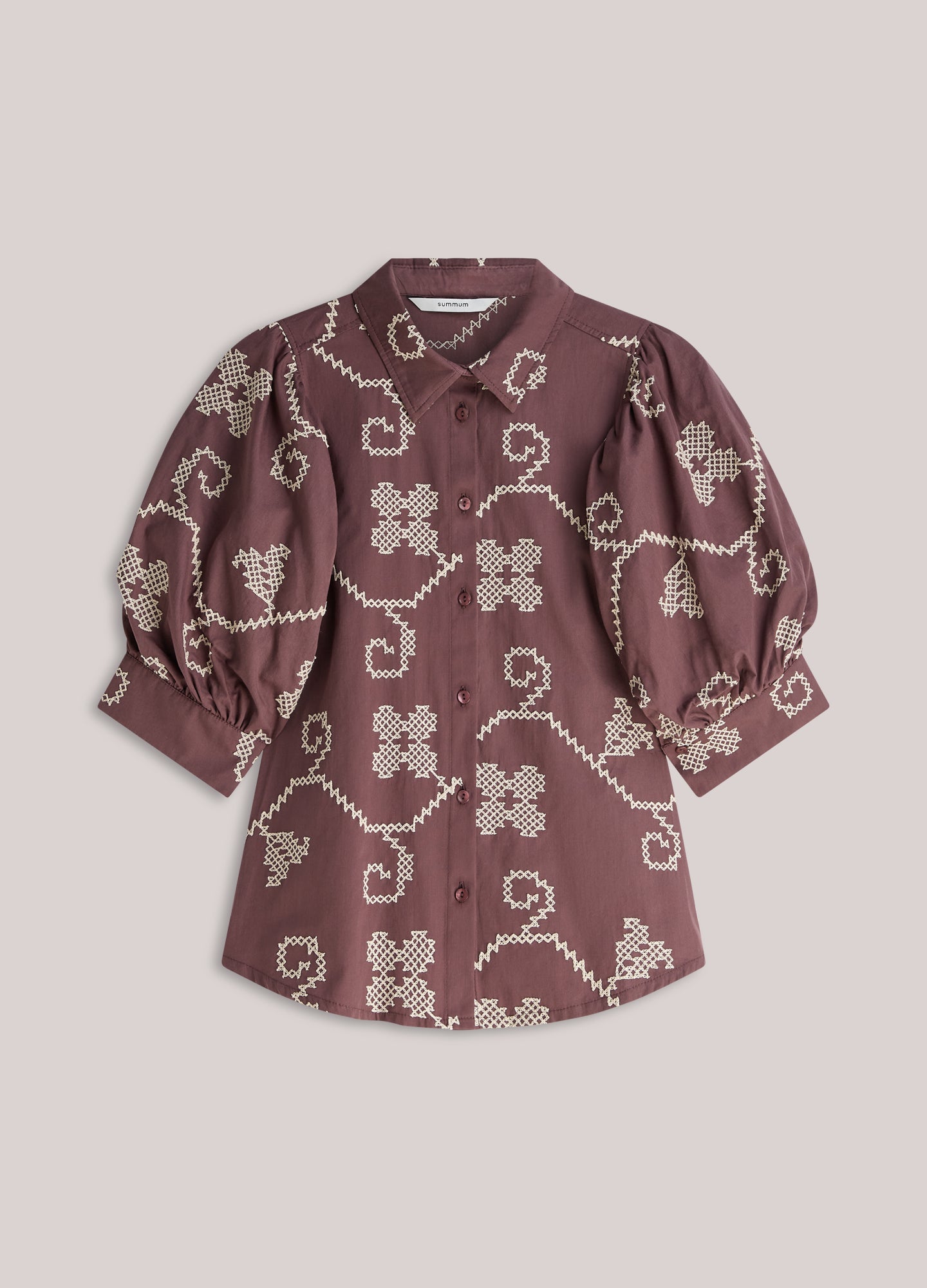 Geborduurde blouse contrast