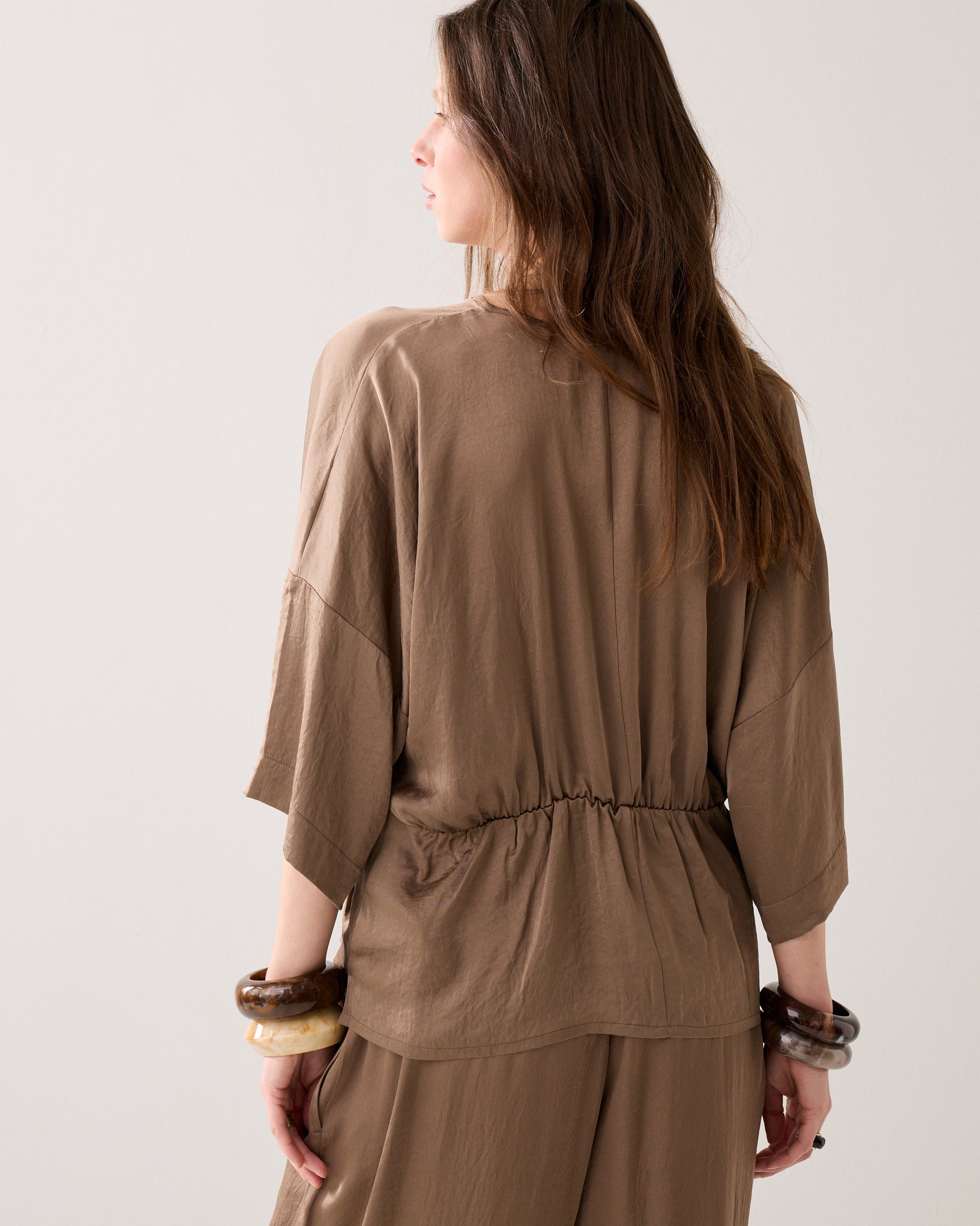 Getailleerde top met sterdetail