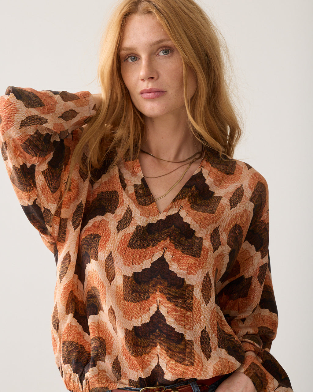 Top with geometric print