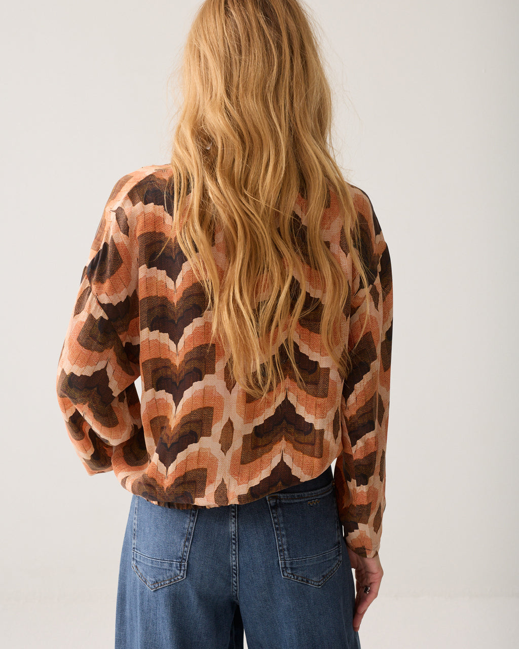 Top with geometric print