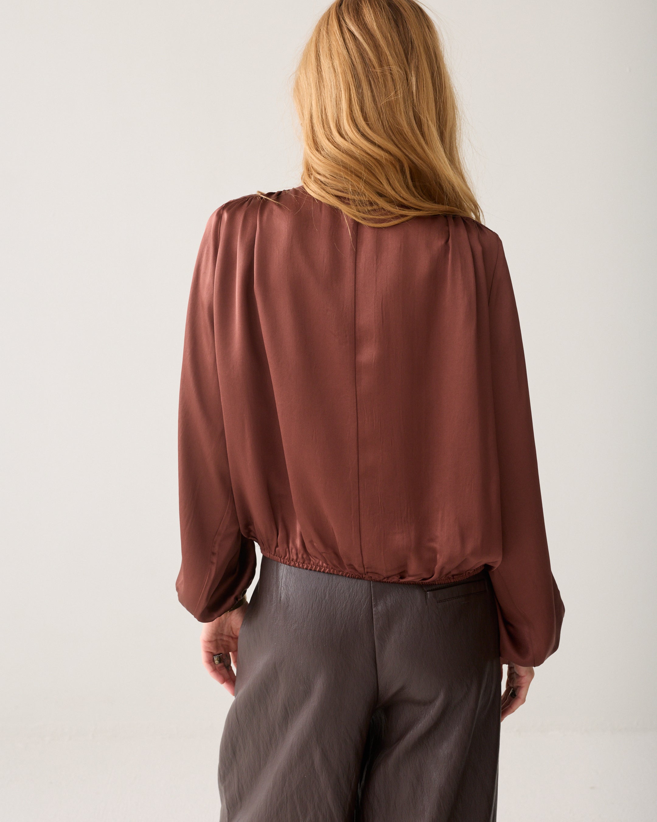 Silky top with bow