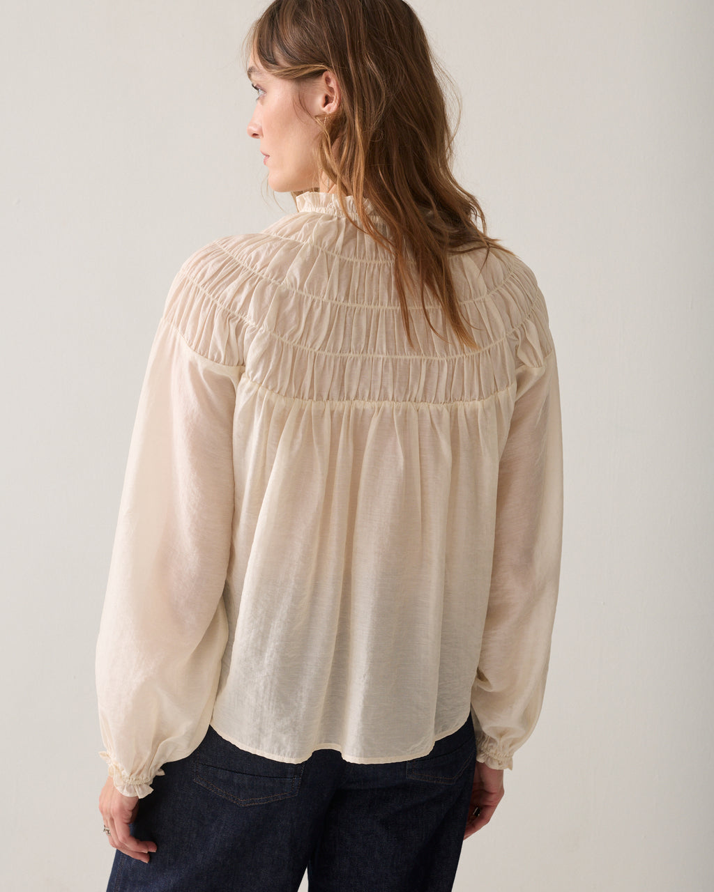 Smocked top with ruffles