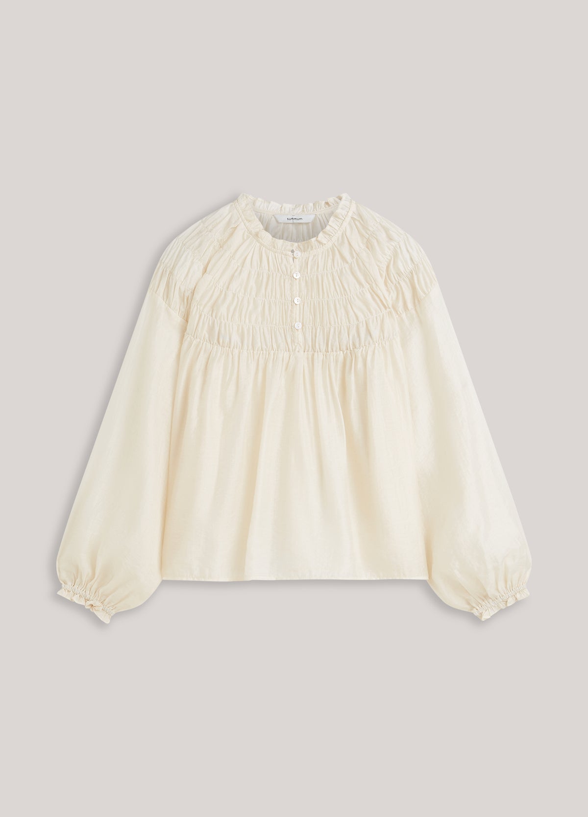 Gesmokte top met ruffles