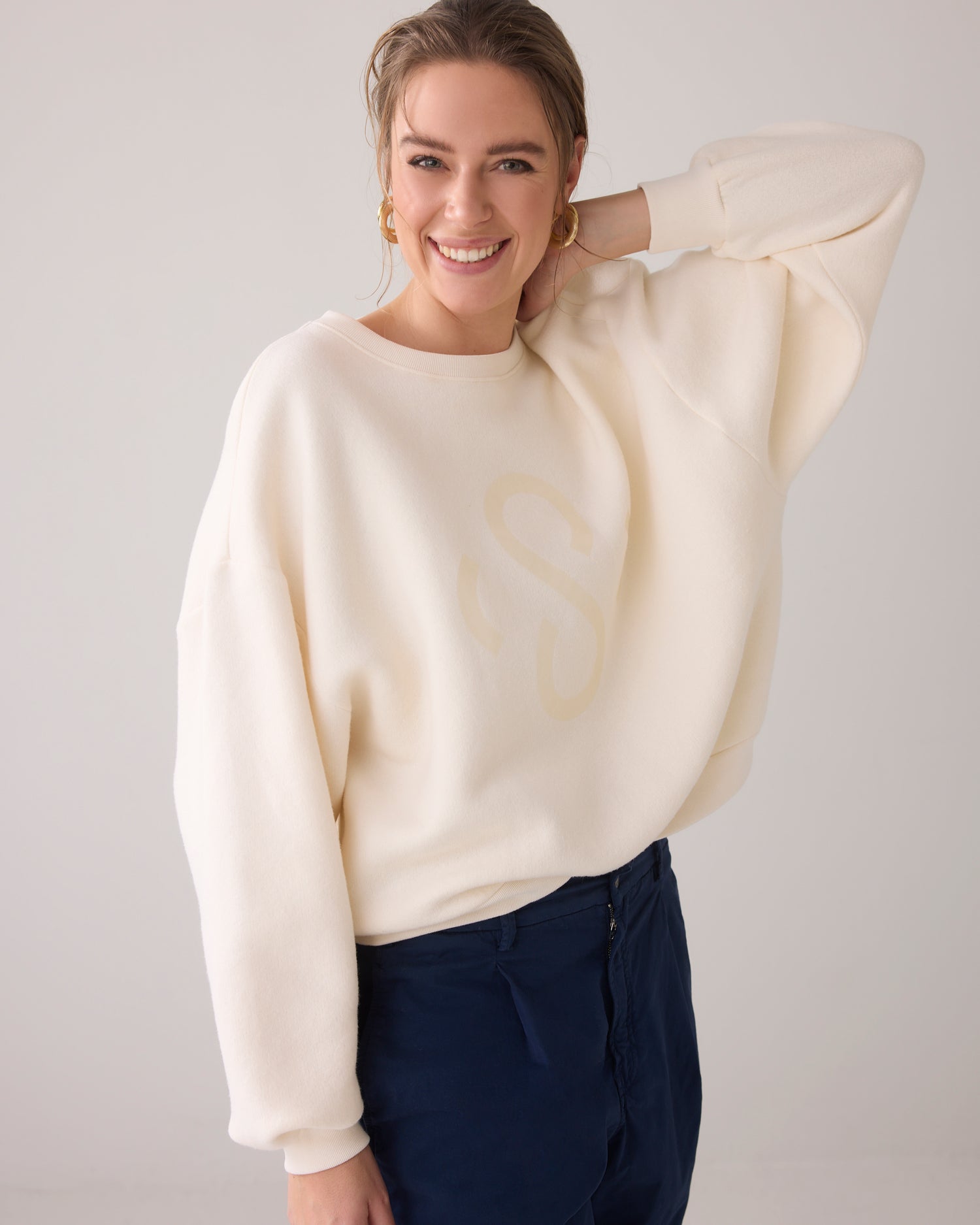 Casual sweater met strass logo
