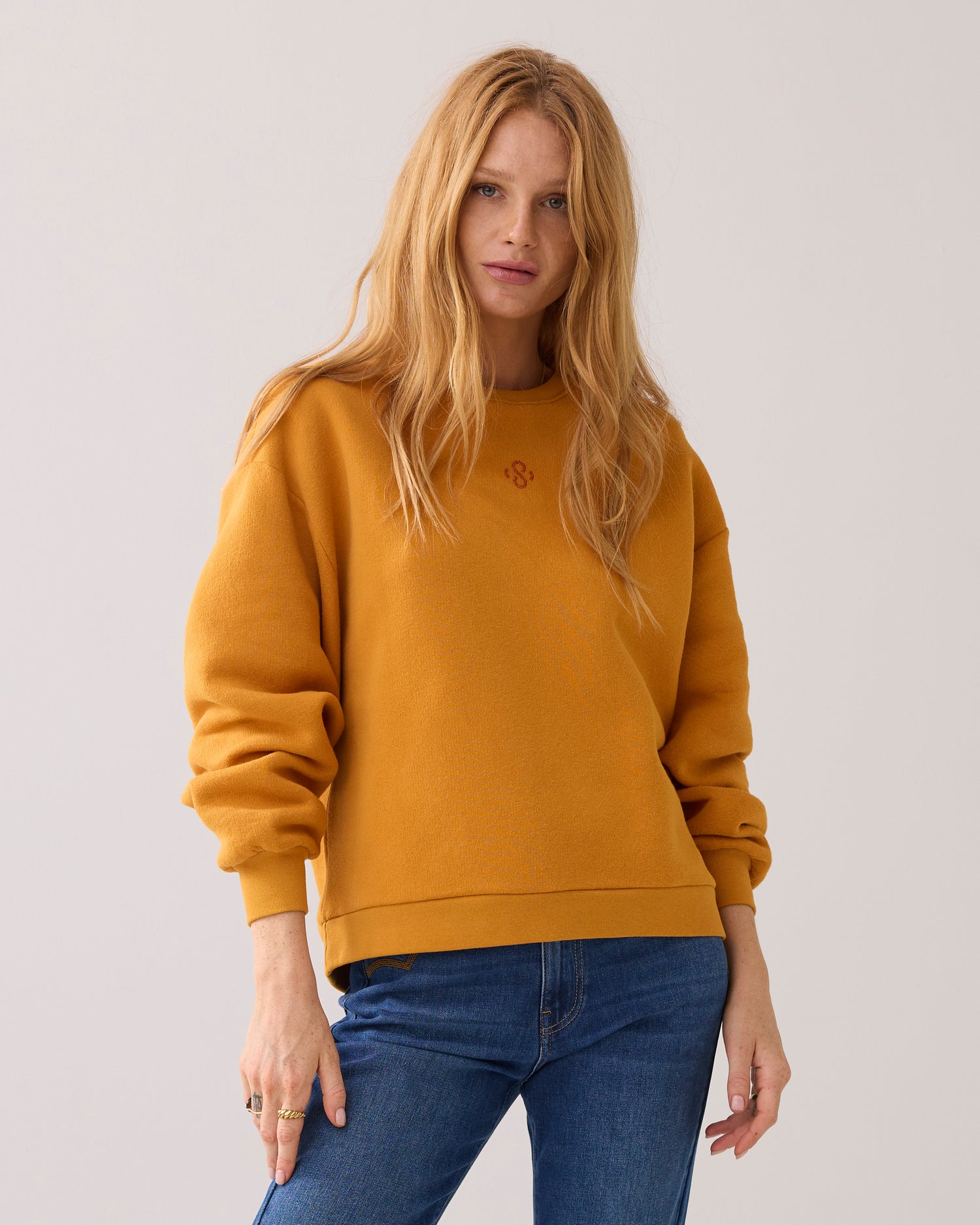 Casual sweater met strass logo