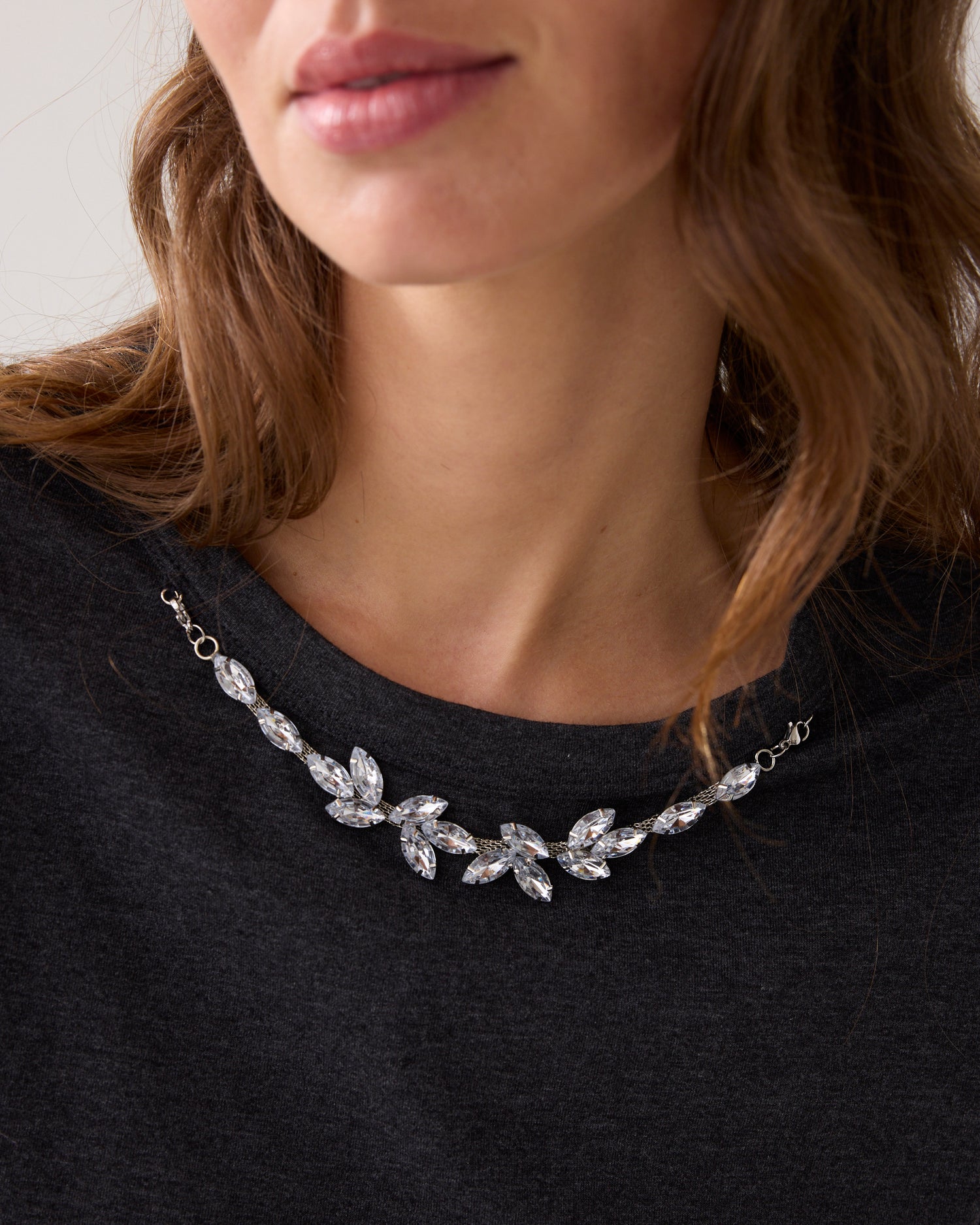 T-shirt with rhinestone necklace