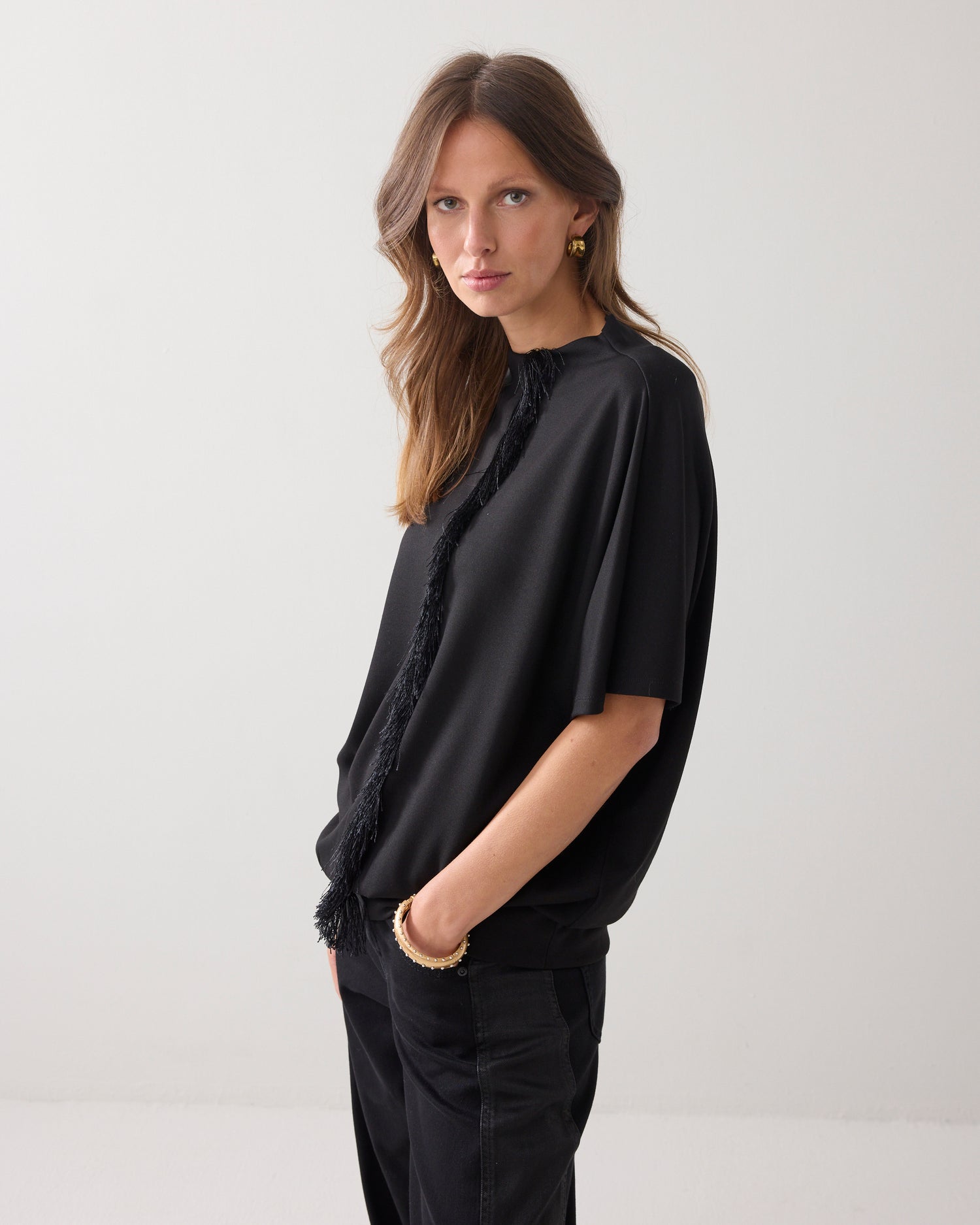 Top met glanzende franjes