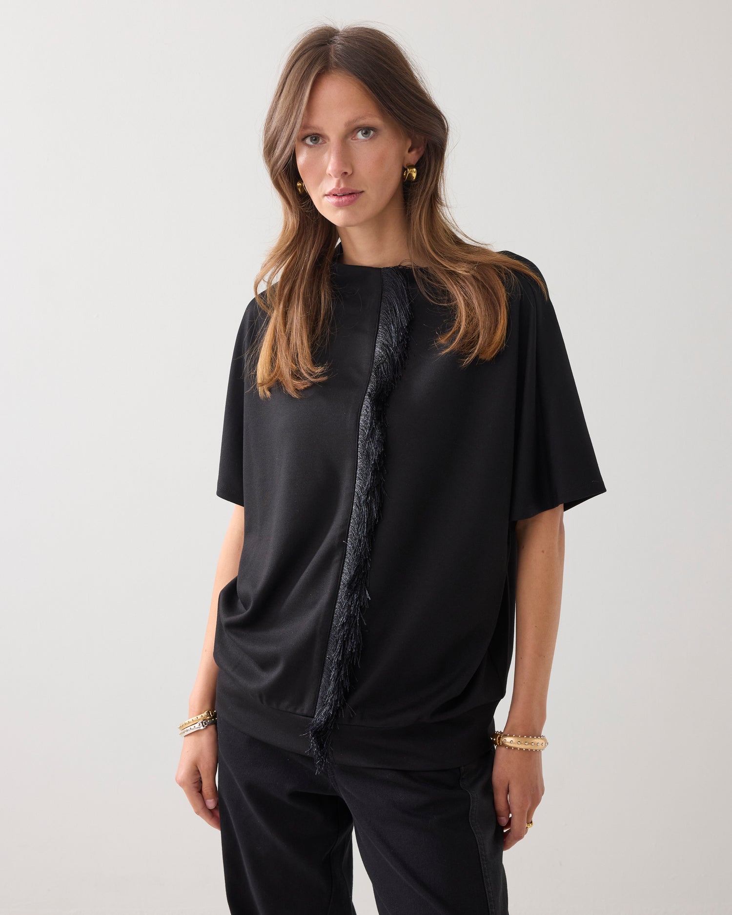 Top met glanzende franjes