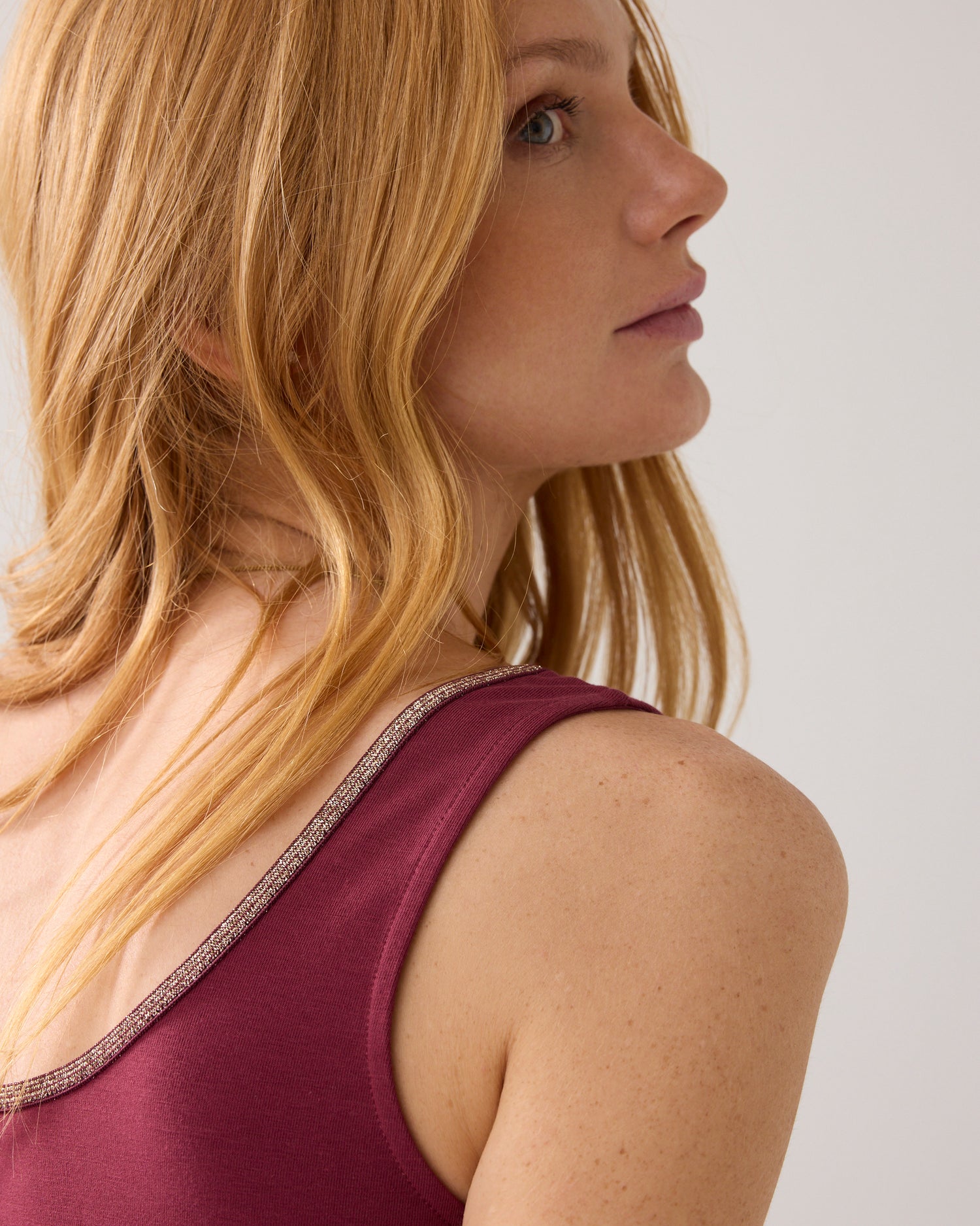 Reversible singlet with glitter trim