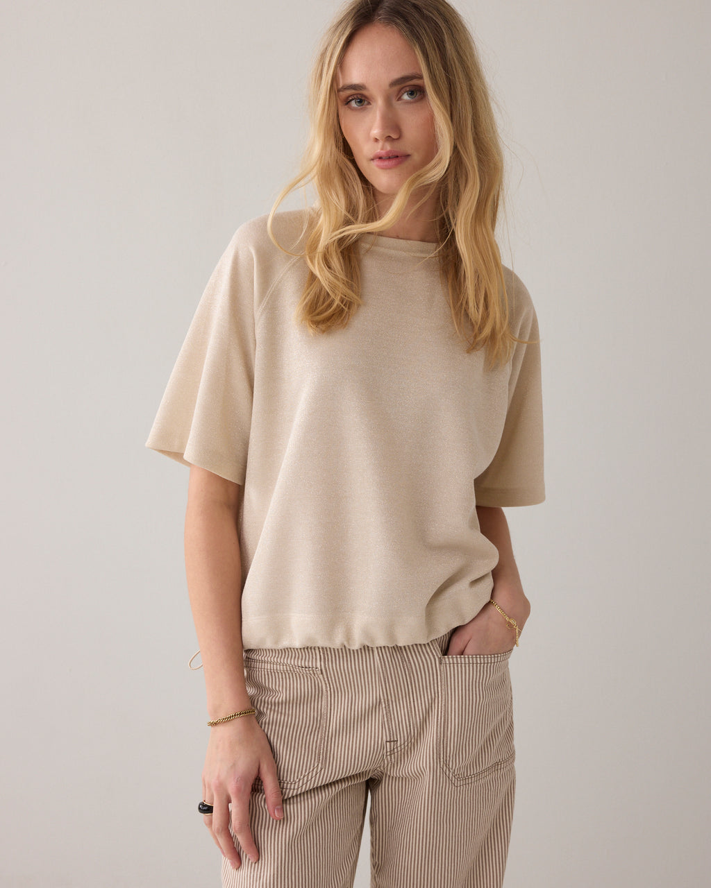 Top van lurex piqué