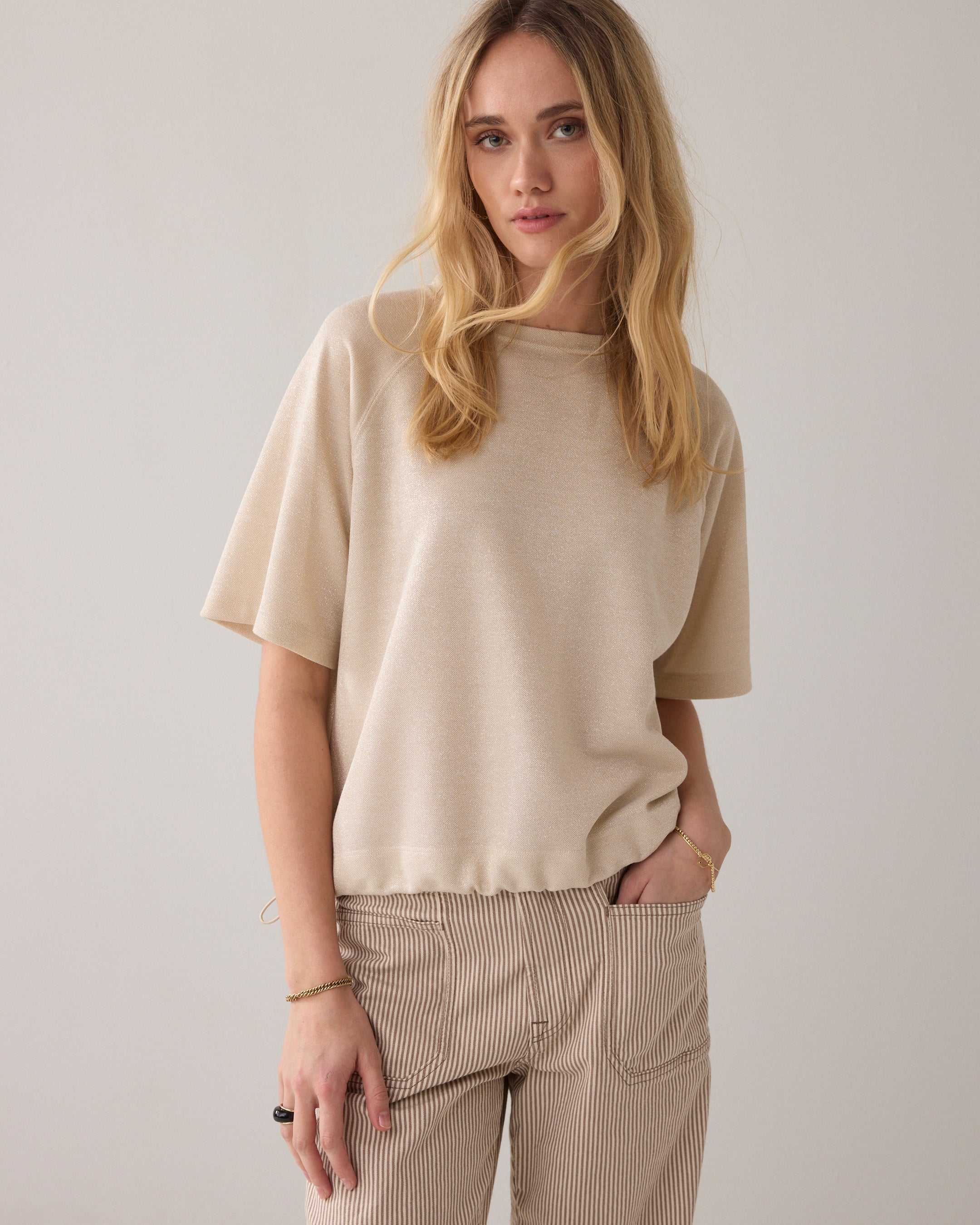 Top van lurex piqué