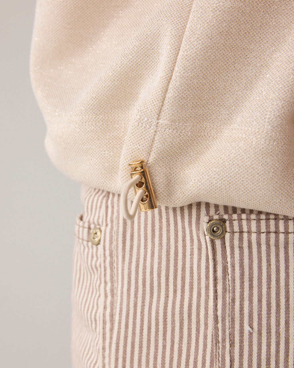 Top van lurex piqué