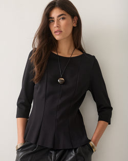 Getailleerde peplum top