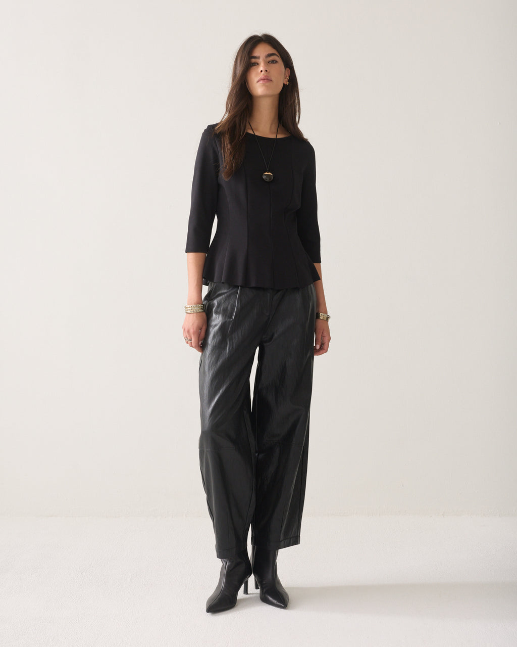 Getailleerde peplum top