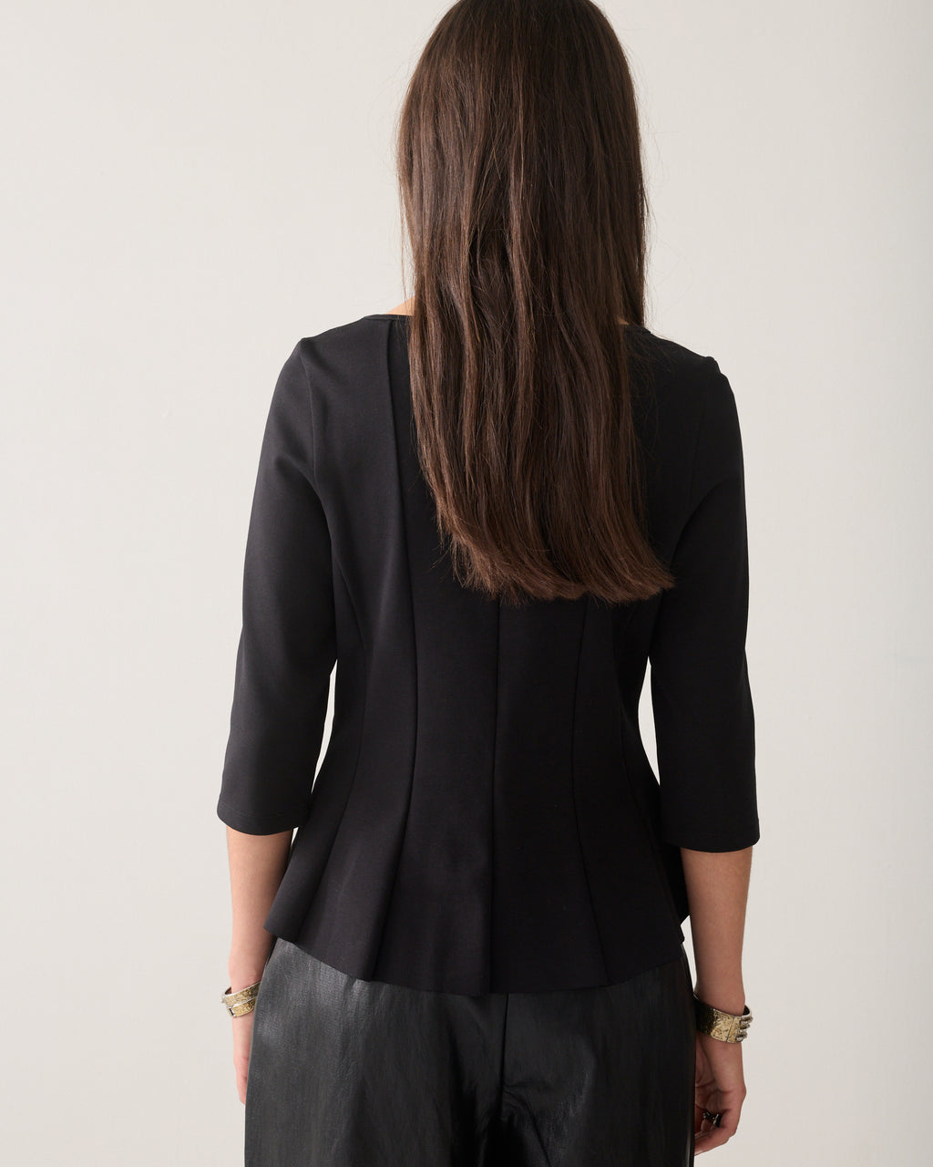 Getailleerde peplum top