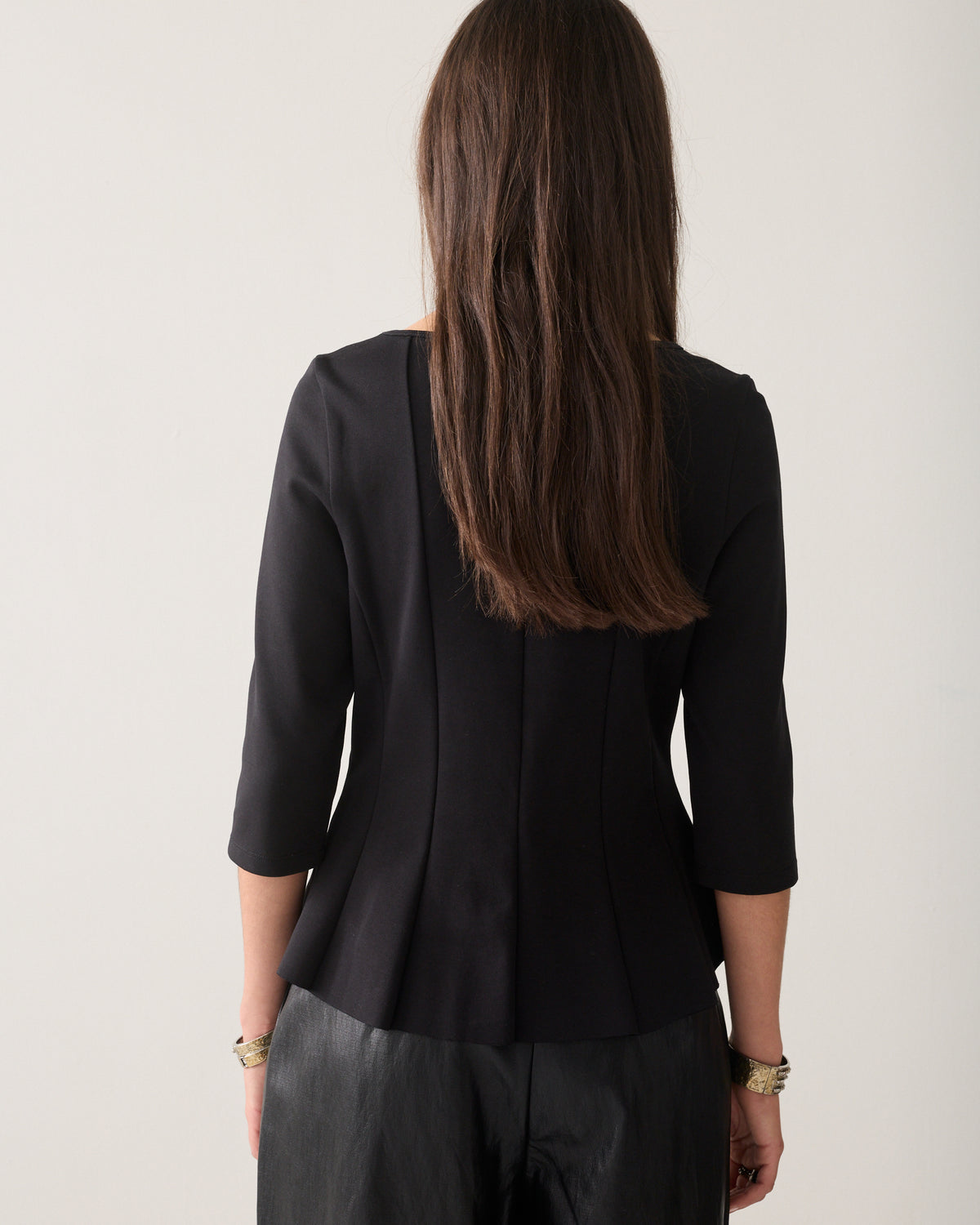 Getailleerde peplum top