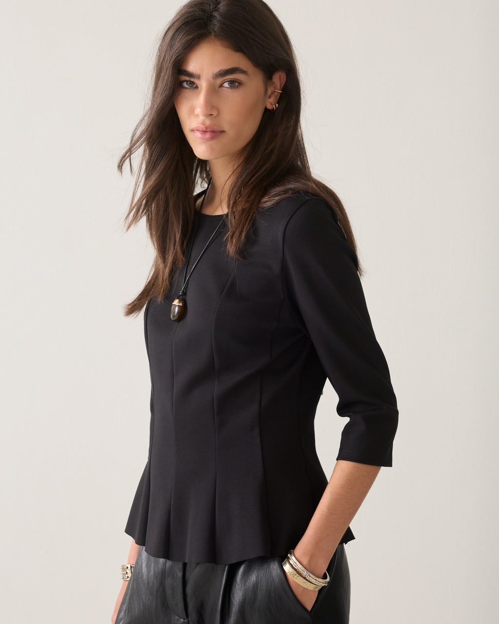 Getailleerde peplum top