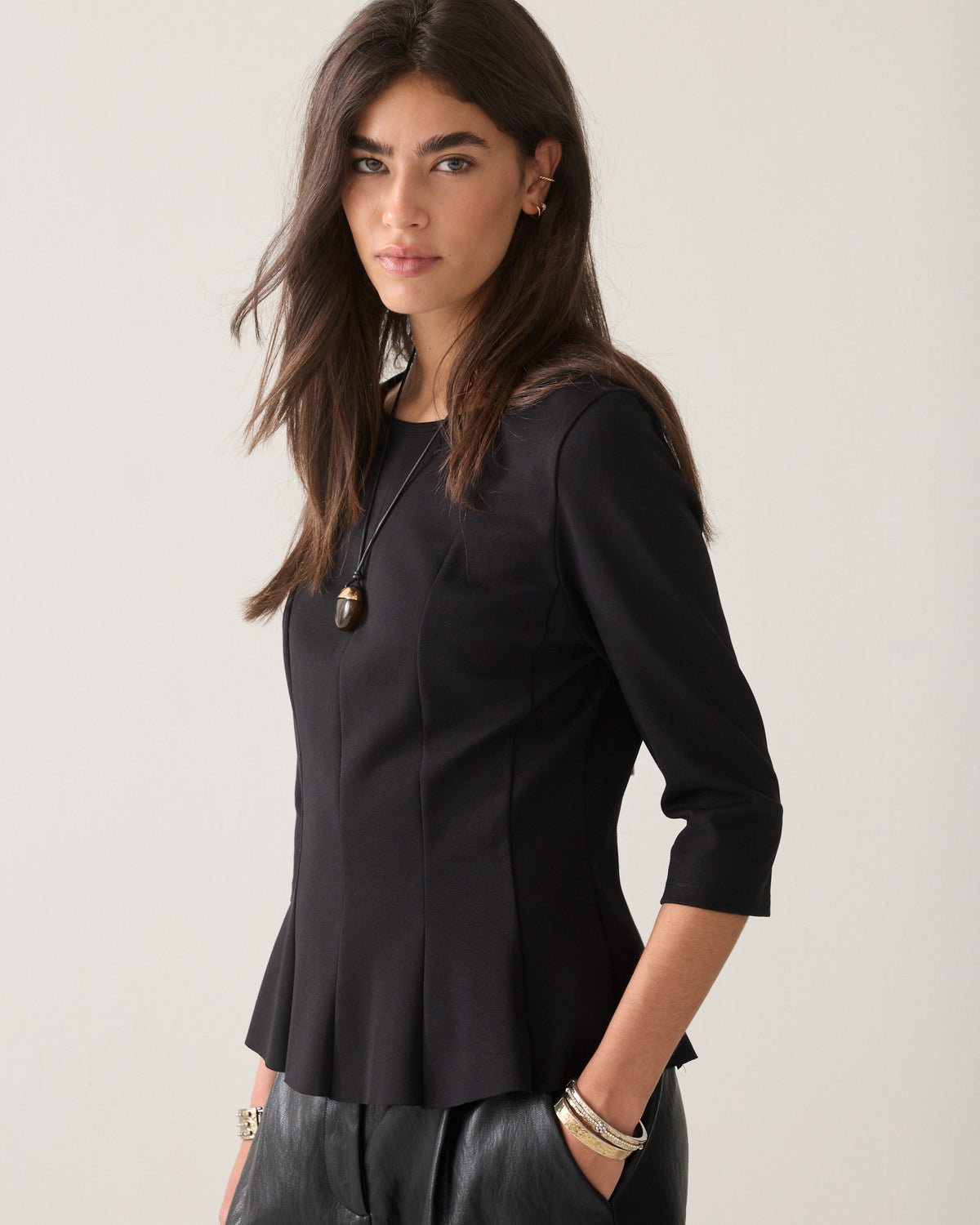 Getailleerde peplum top