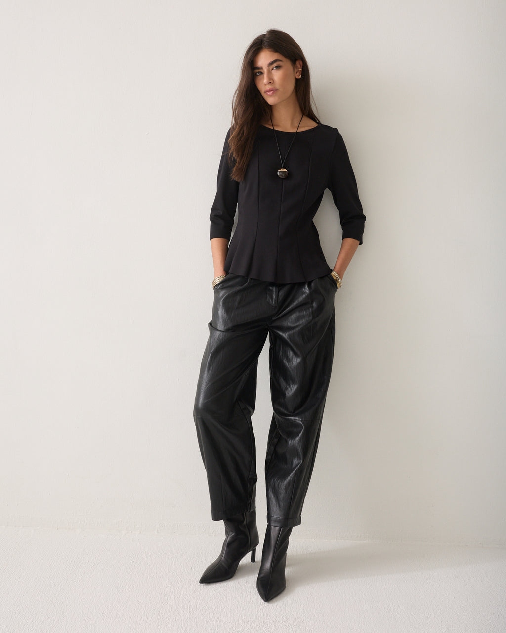 Getailleerde peplum top